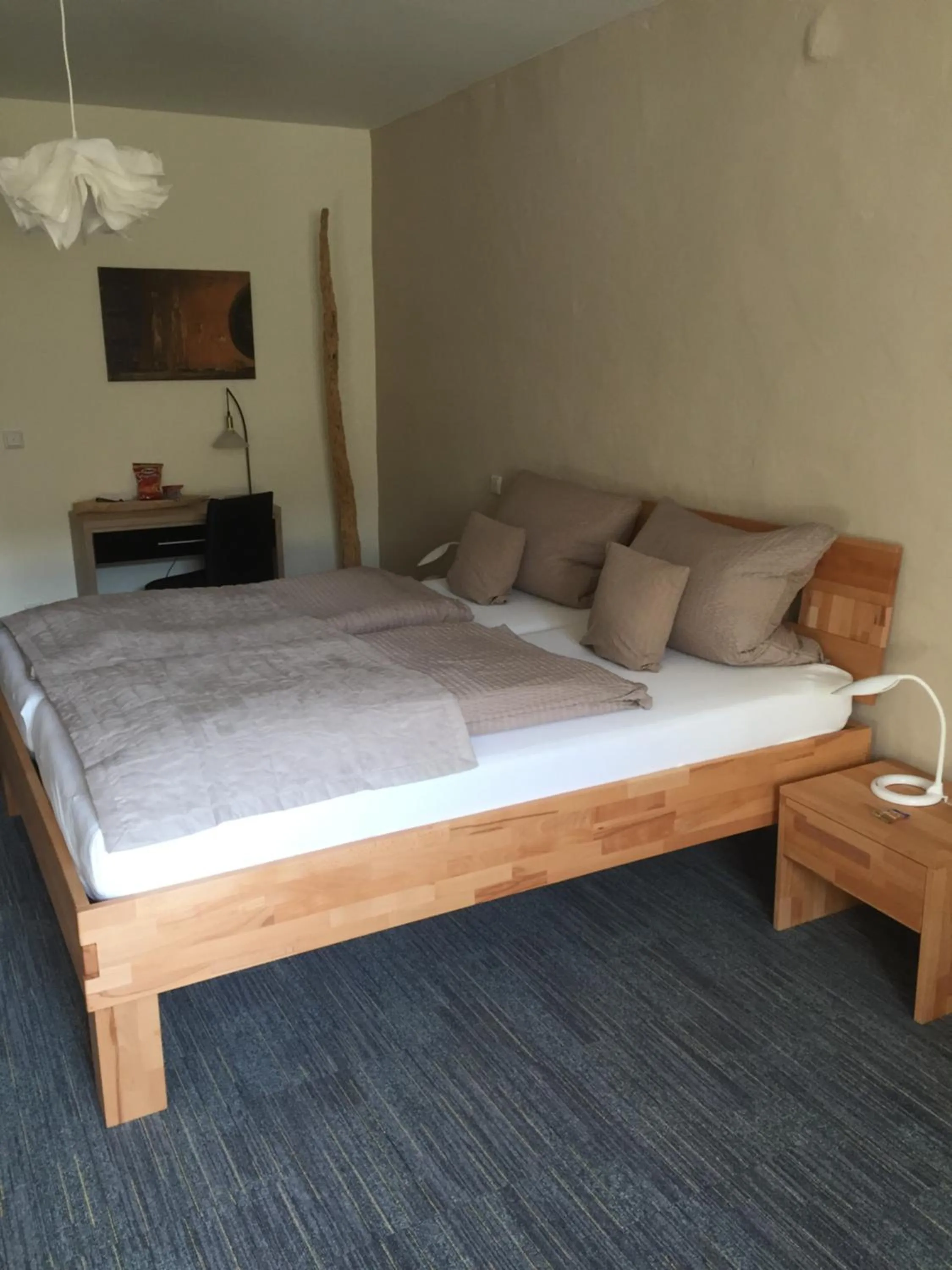 Photo of the whole room, Bed in Alter Winzerhof Weisenheim am Berg e.K.