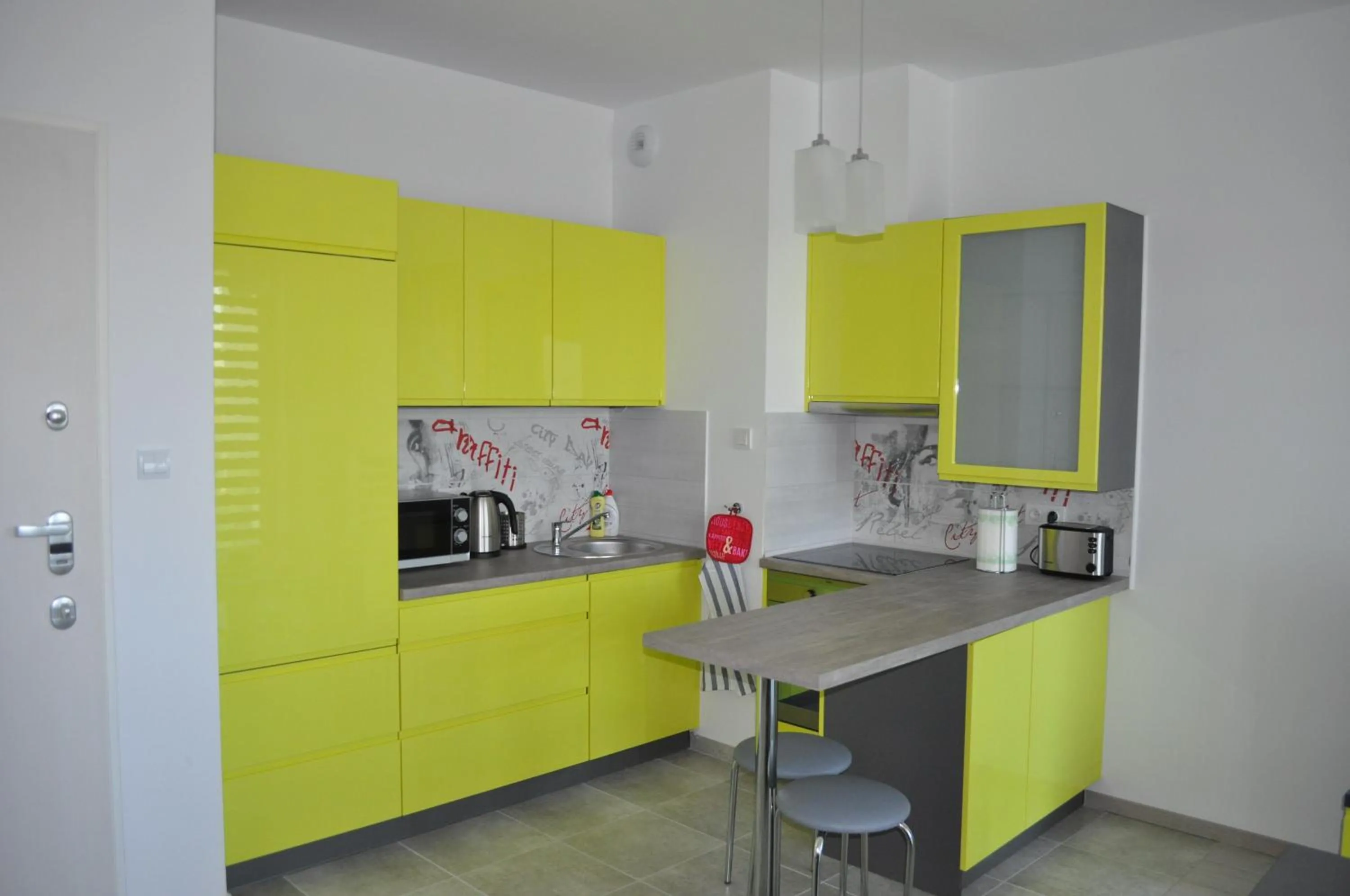 Kitchen or kitchenette in Pop Art Apartments