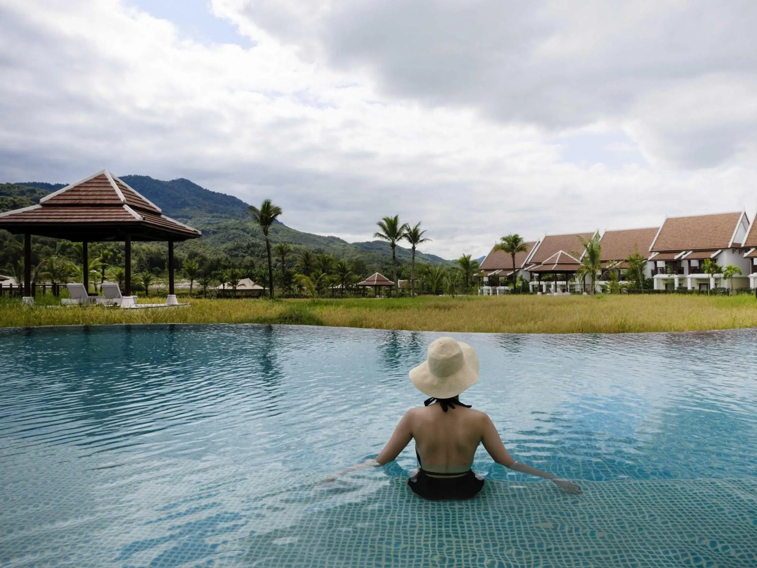 Pool view in Pullman Luang Prabang Pool view in Pullman Luang Prabang