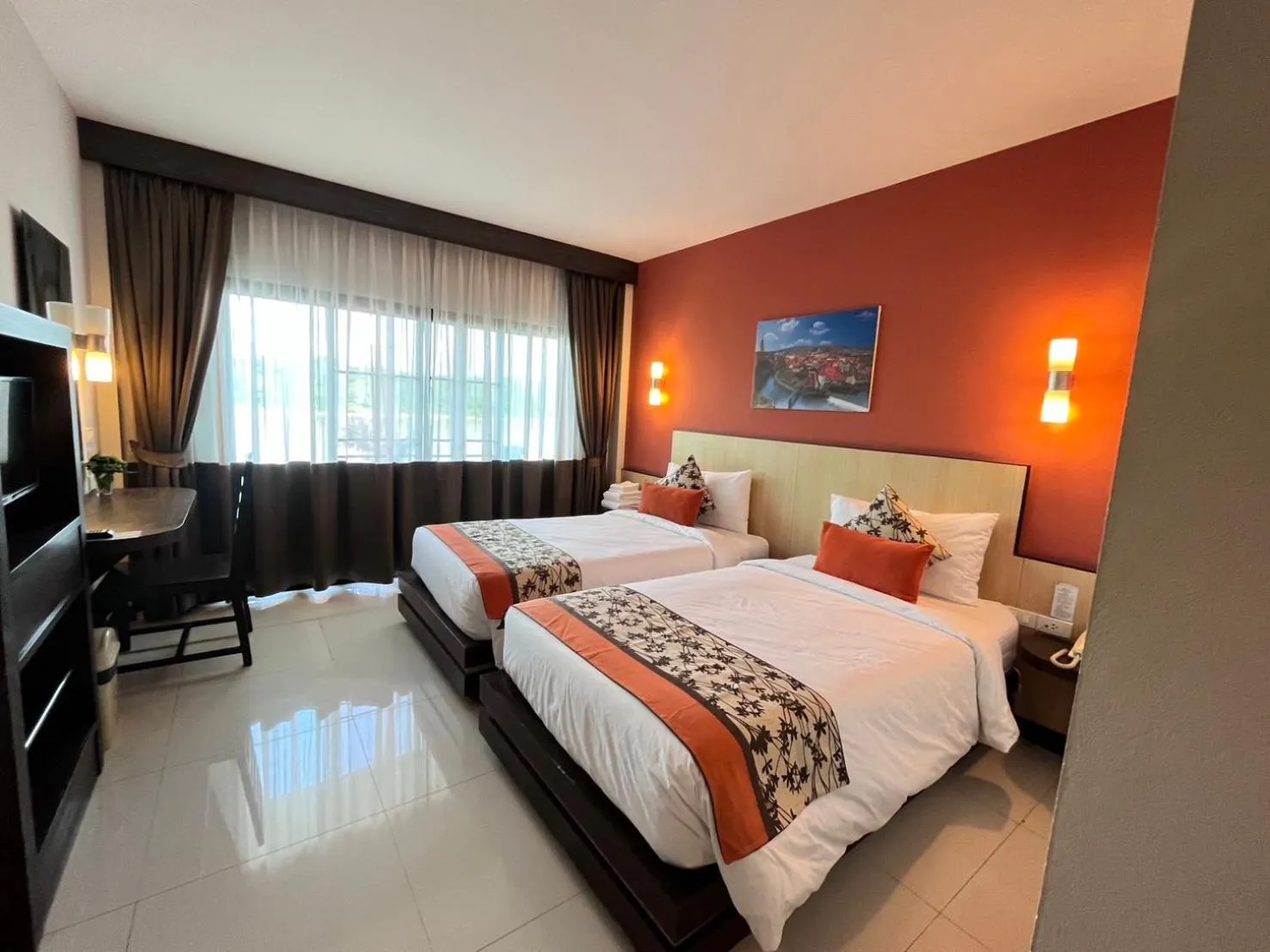 Bed in Chiangkhong Teak Garden Riverfront Onsen Hotel- SHA Extra Plus