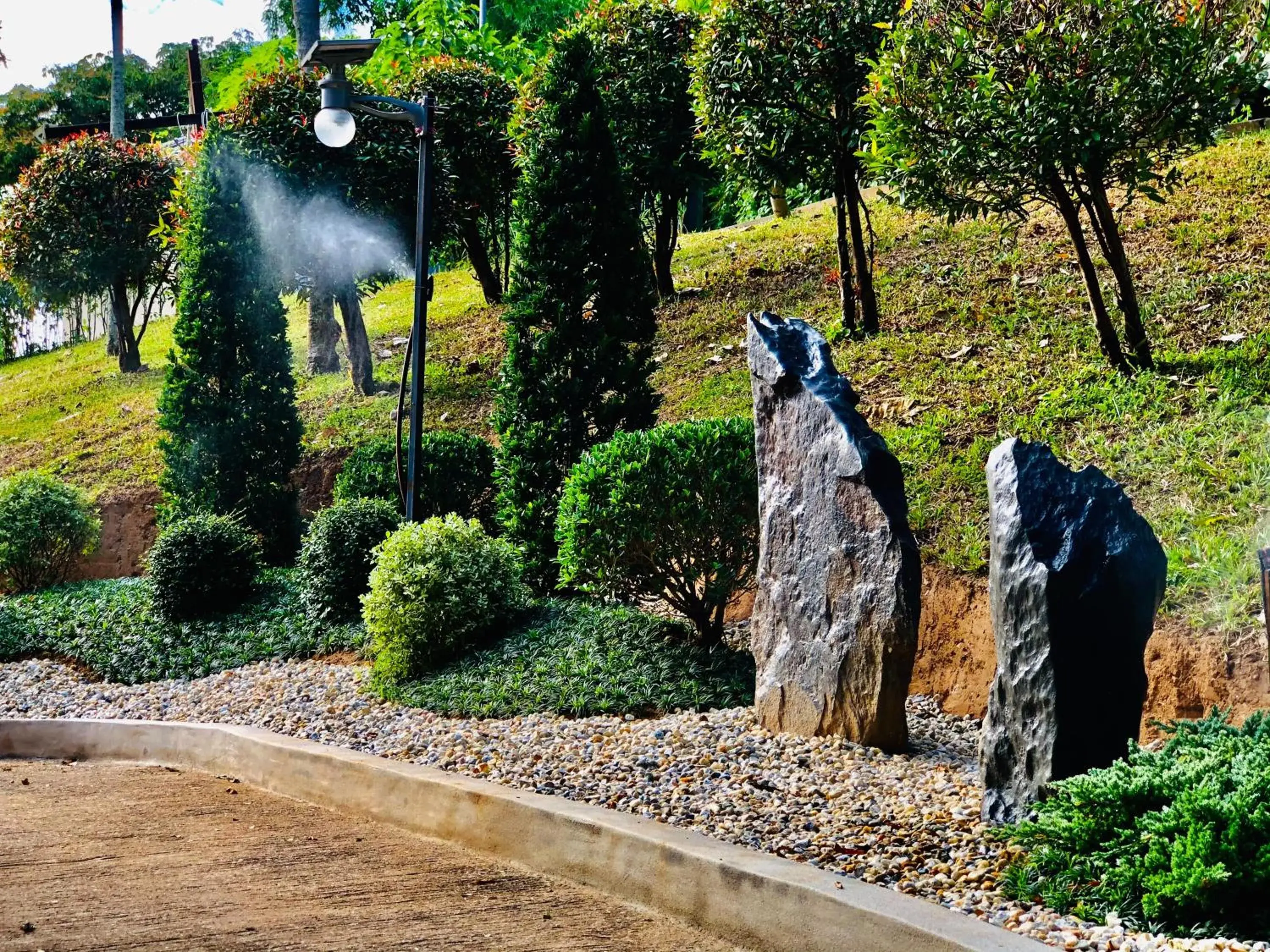 Garden view in Chiangkhong Teak Garden Riverfront Onsen Hotel- SHA Extra Plus Garden view in Chiangkhong Teak Garden Riverfront Onsen Hotel- SHA Extra Plus