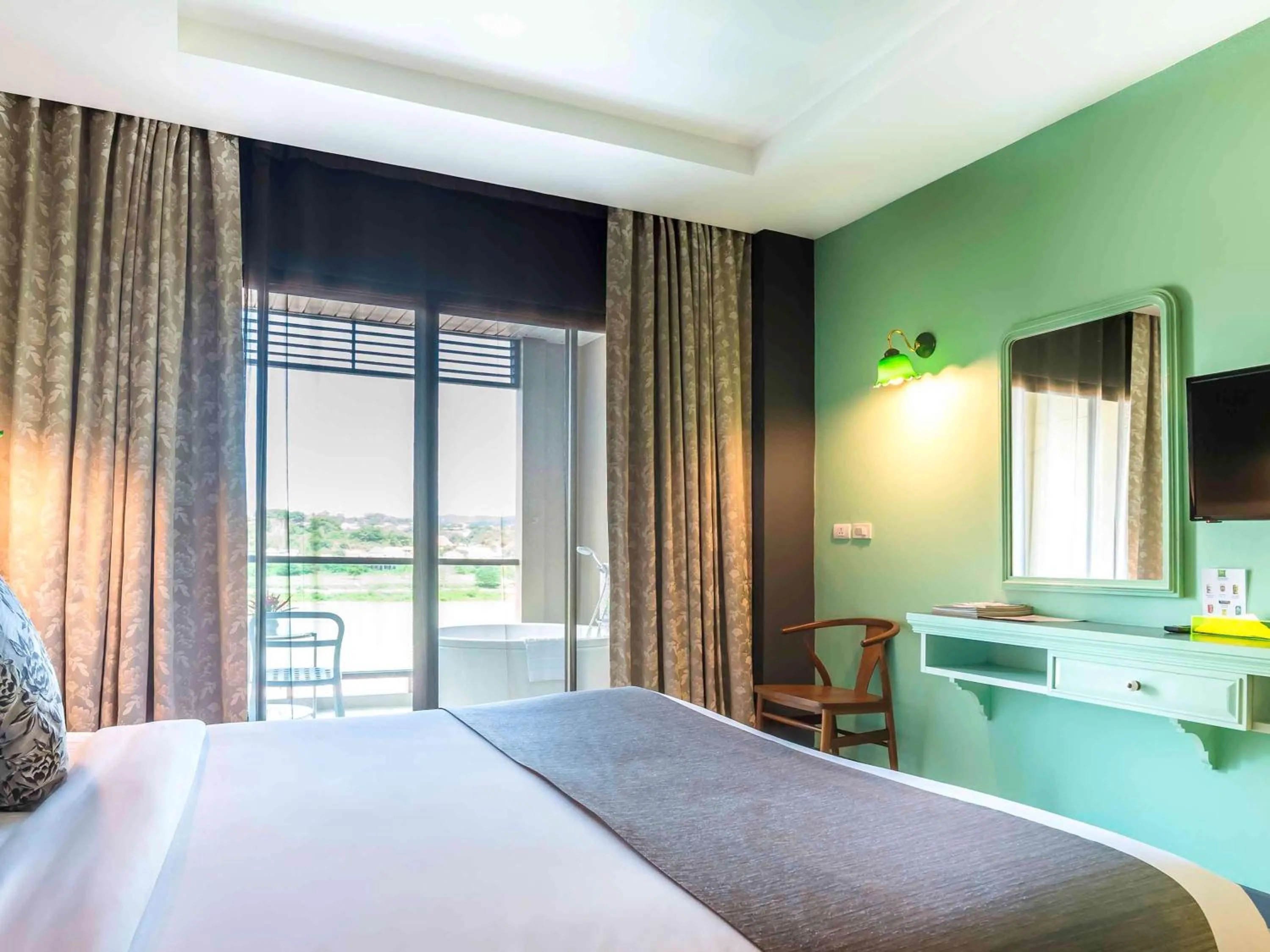 Photo of the whole room, Bed in Chiangkhong Teak Garden Riverfront Onsen Hotel- SHA Extra Plus