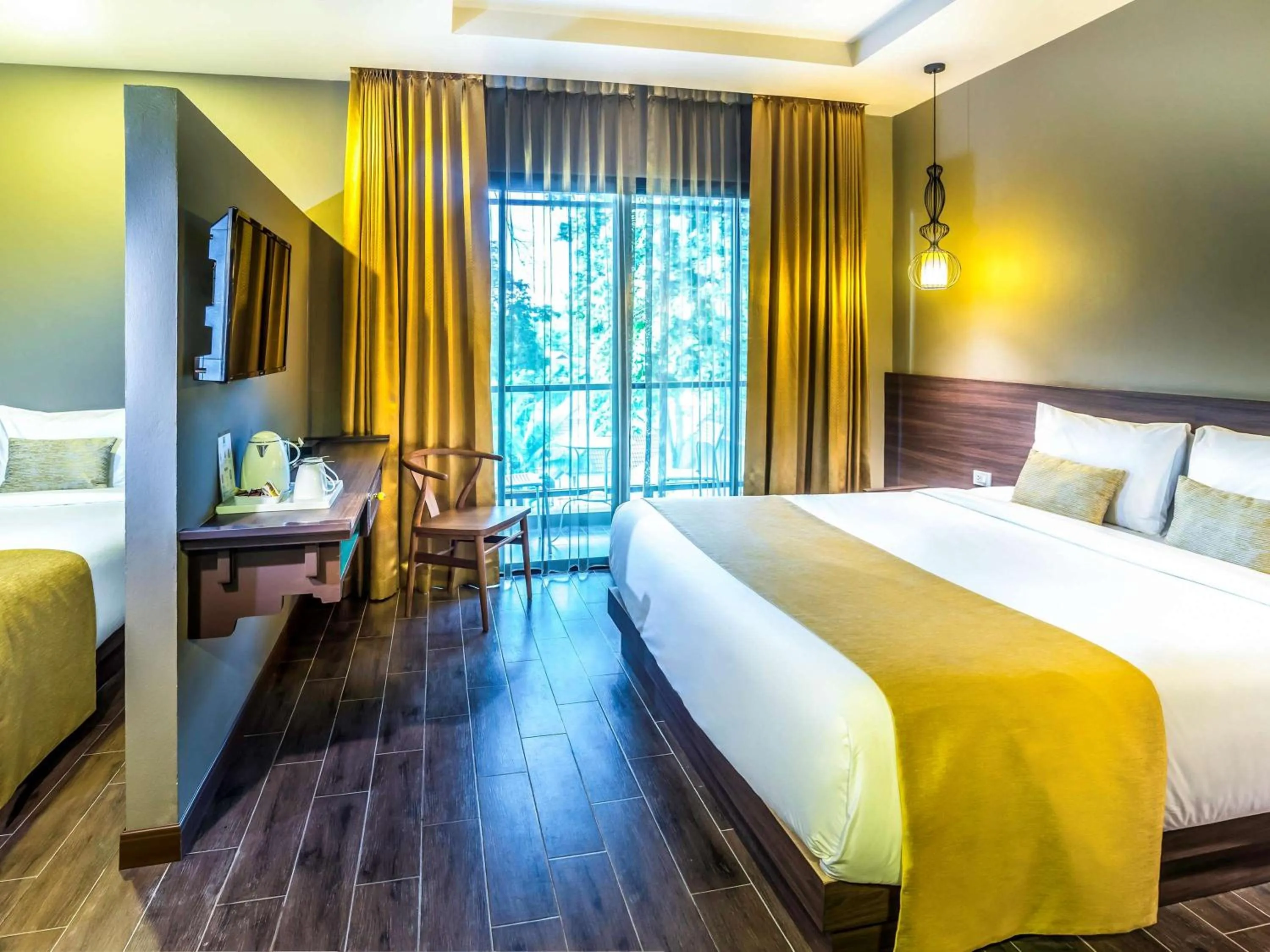 Photo of the whole room, Bed in Chiangkhong Teak Garden Riverfront Onsen Hotel- SHA Extra Plus