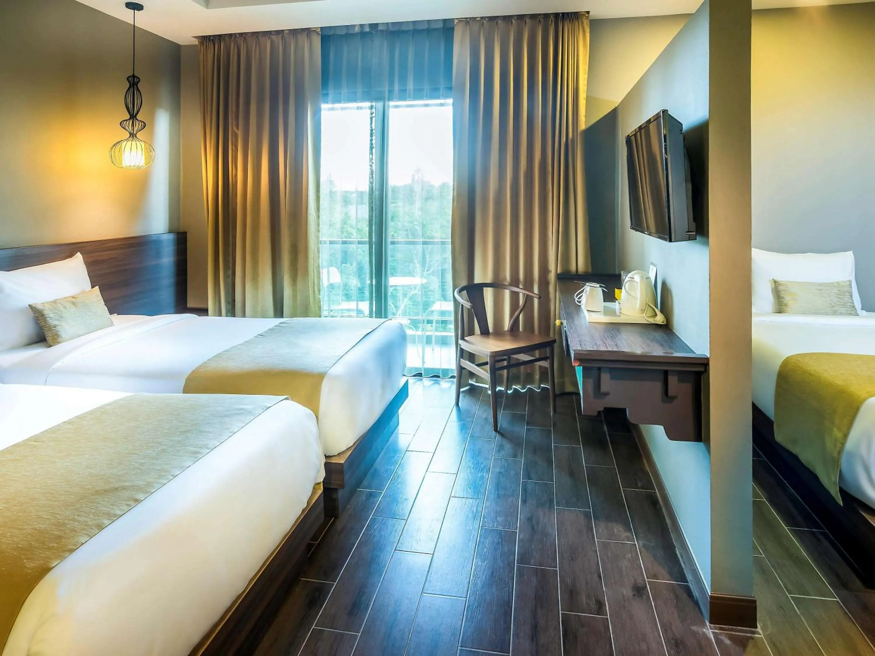 Photo of the whole room, Bed in Chiangkhong Teak Garden Riverfront Onsen Hotel- SHA Extra Plus
