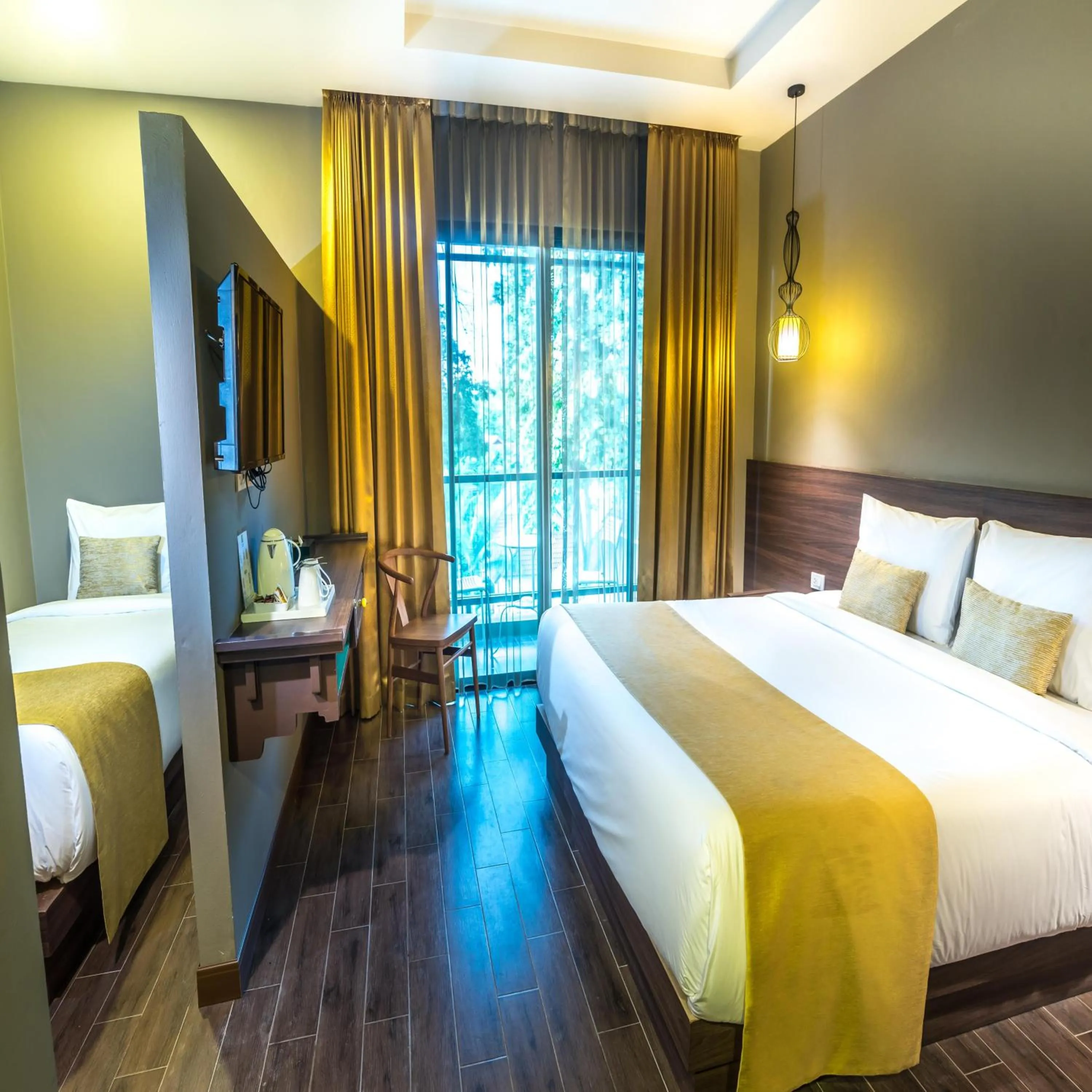 Photo of the whole room, Bed in Chiangkhong Teak Garden Riverfront Onsen Hotel- SHA Extra Plus