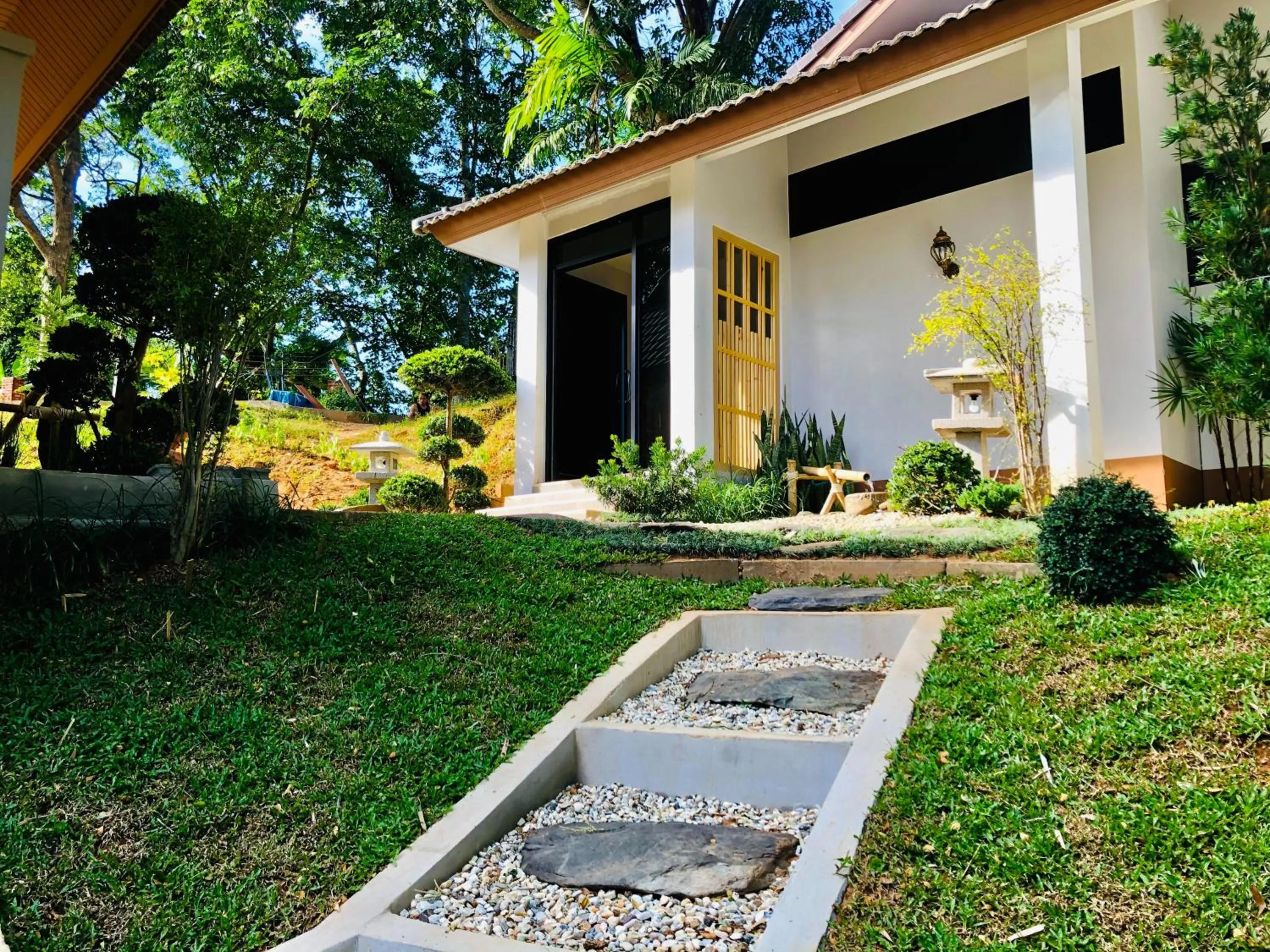 Garden in Chiangkhong Teak Garden Riverfront Onsen Hotel- SHA Extra Plus