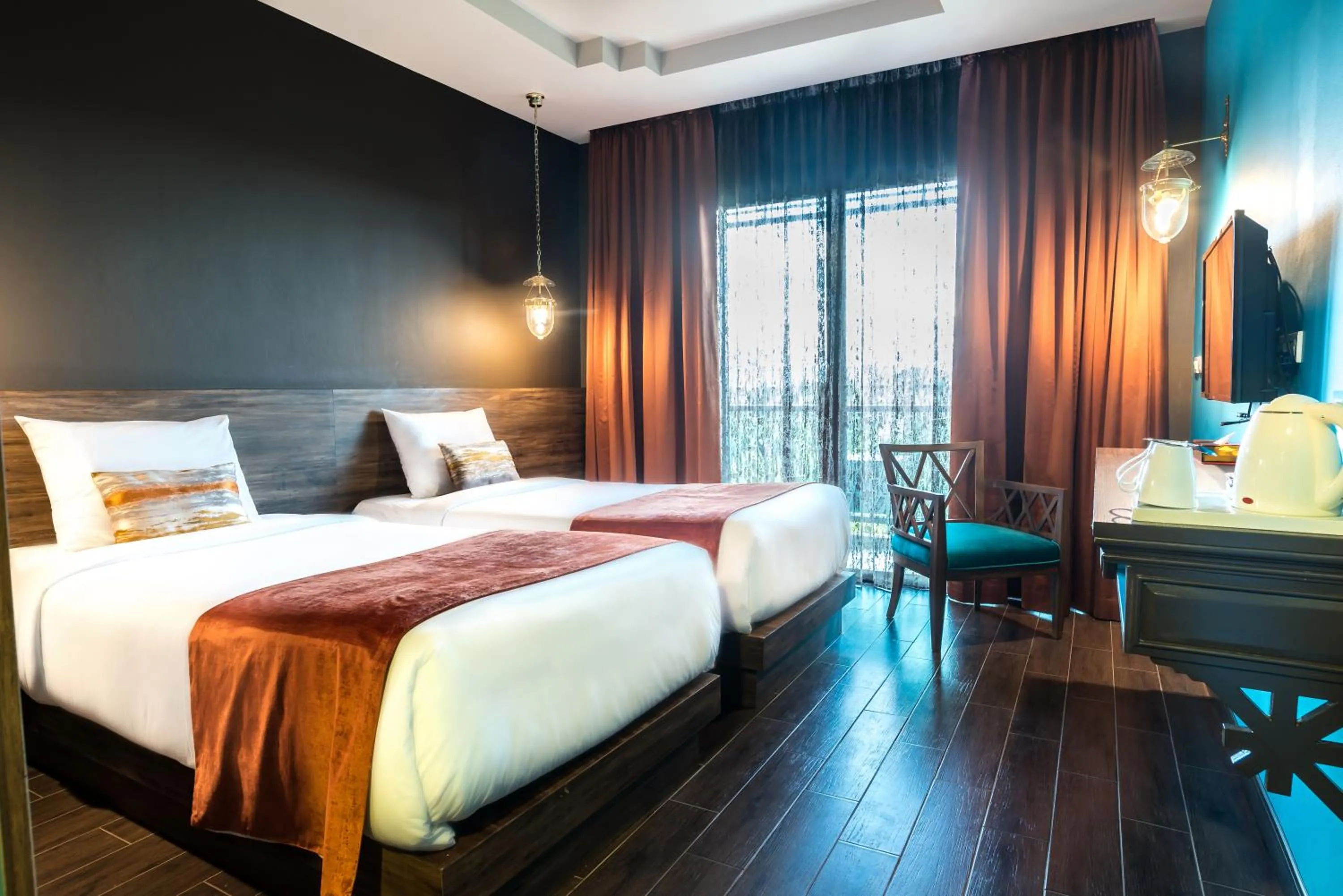 Photo of the whole room, Bed in Chiangkhong Teak Garden Riverfront Onsen Hotel- SHA Extra Plus