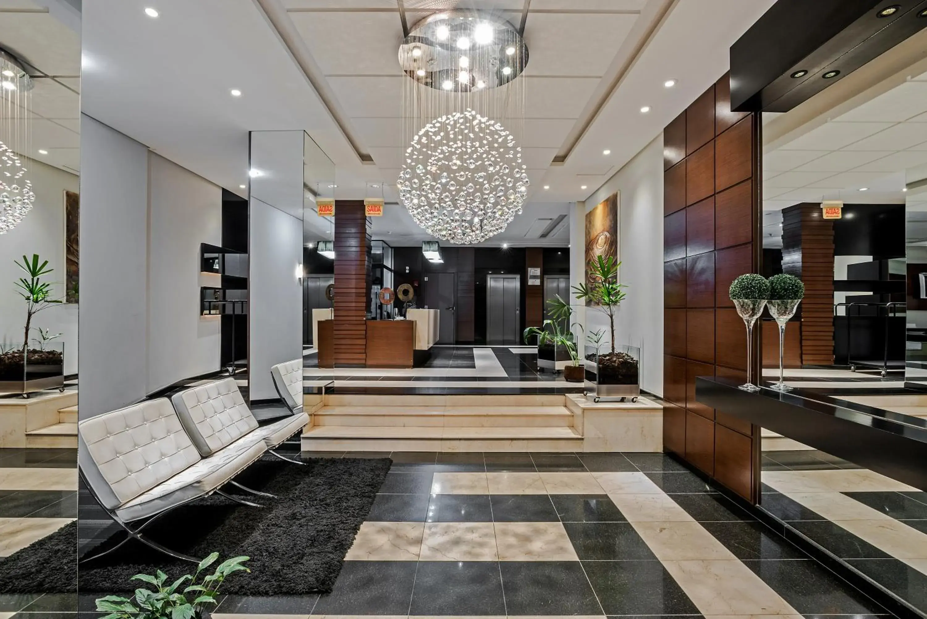 Lobby or reception in Astron Ponta Grossa Plaza by Nobile Lobby or reception in Astron Ponta Grossa Plaza by Nobile