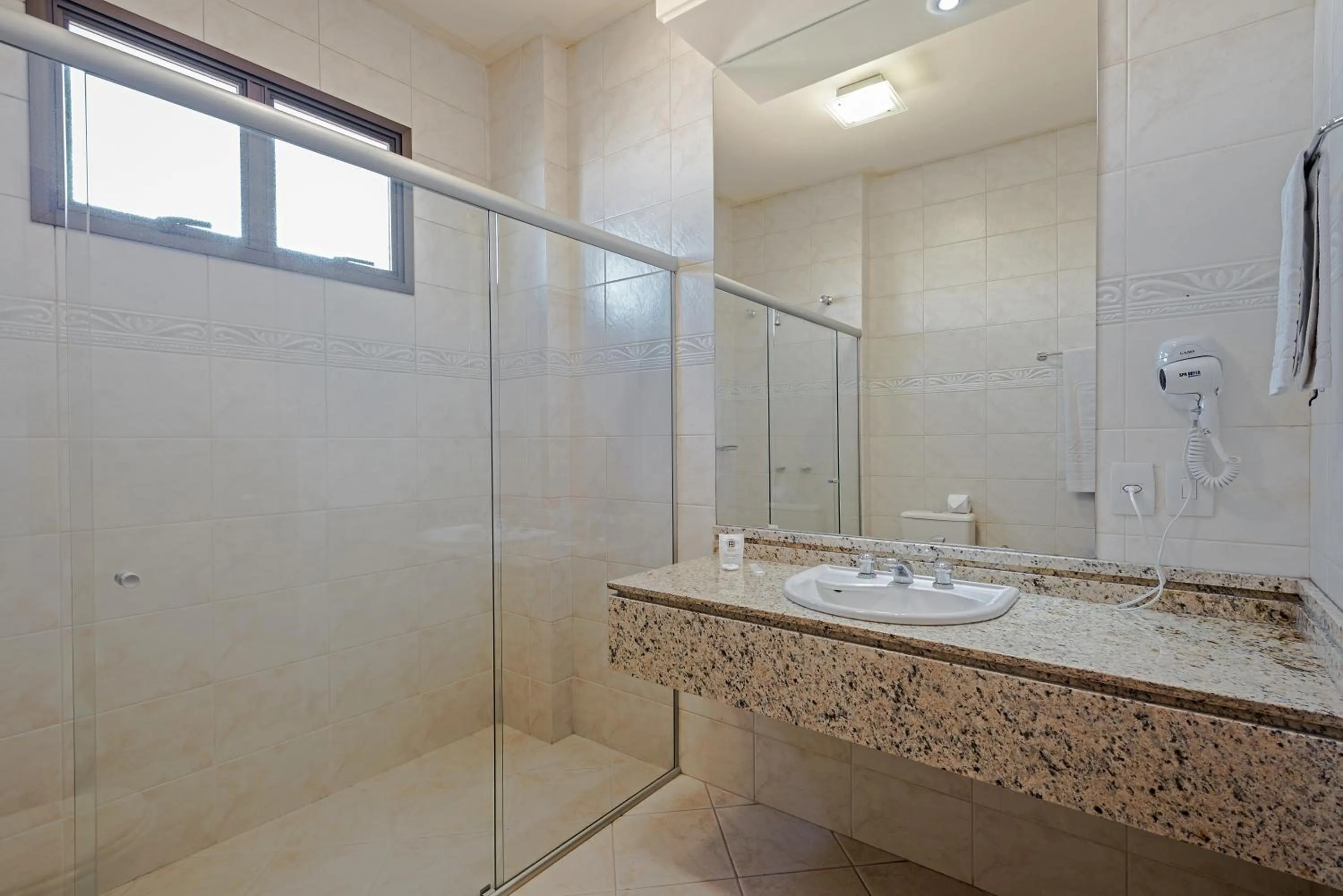 Bathroom in Astron Ponta Grossa Plaza by Nobile