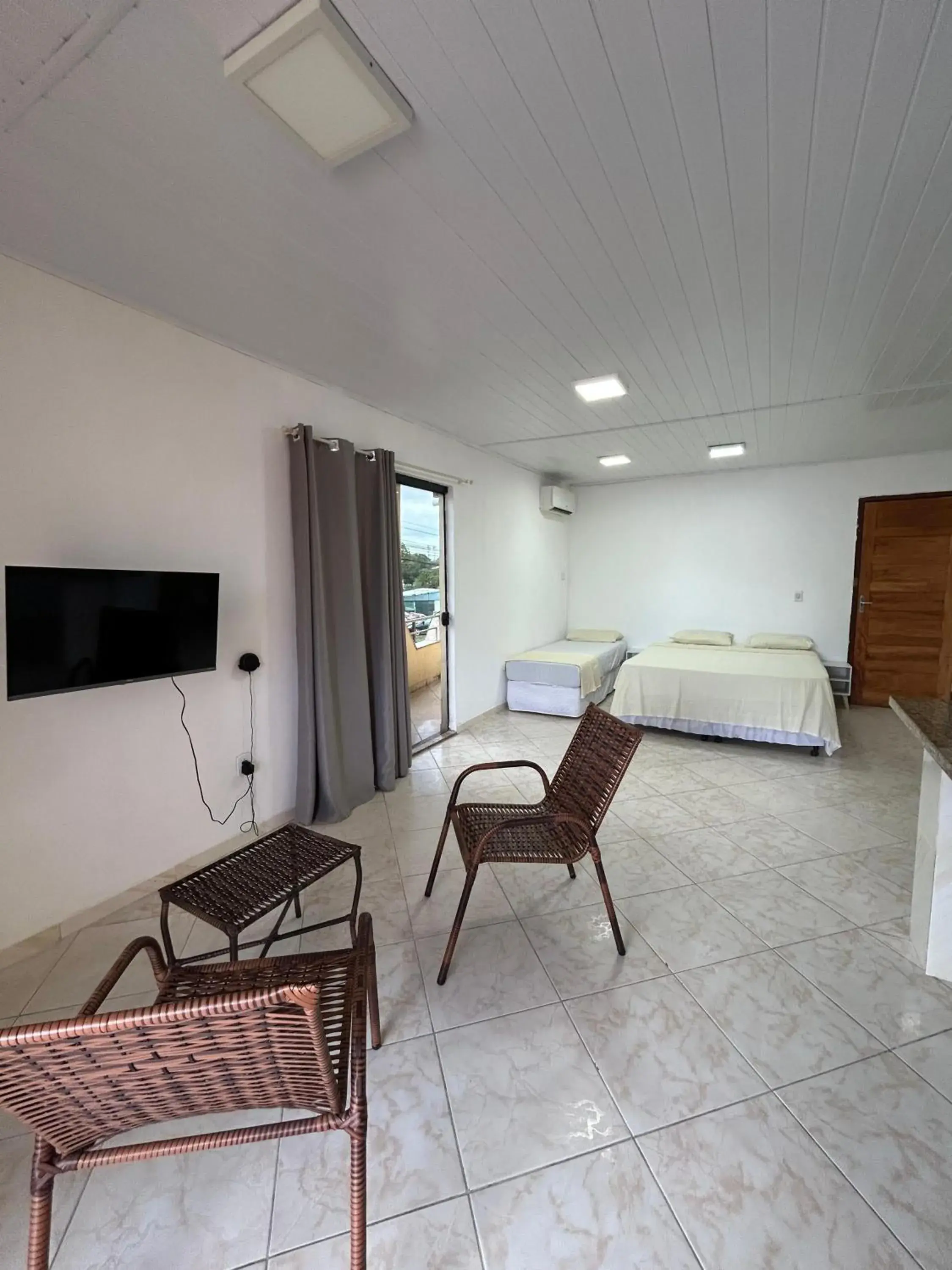 Triple Room with Balcony in Pousada Luar Triple Room with Balcony in Pousada Luar