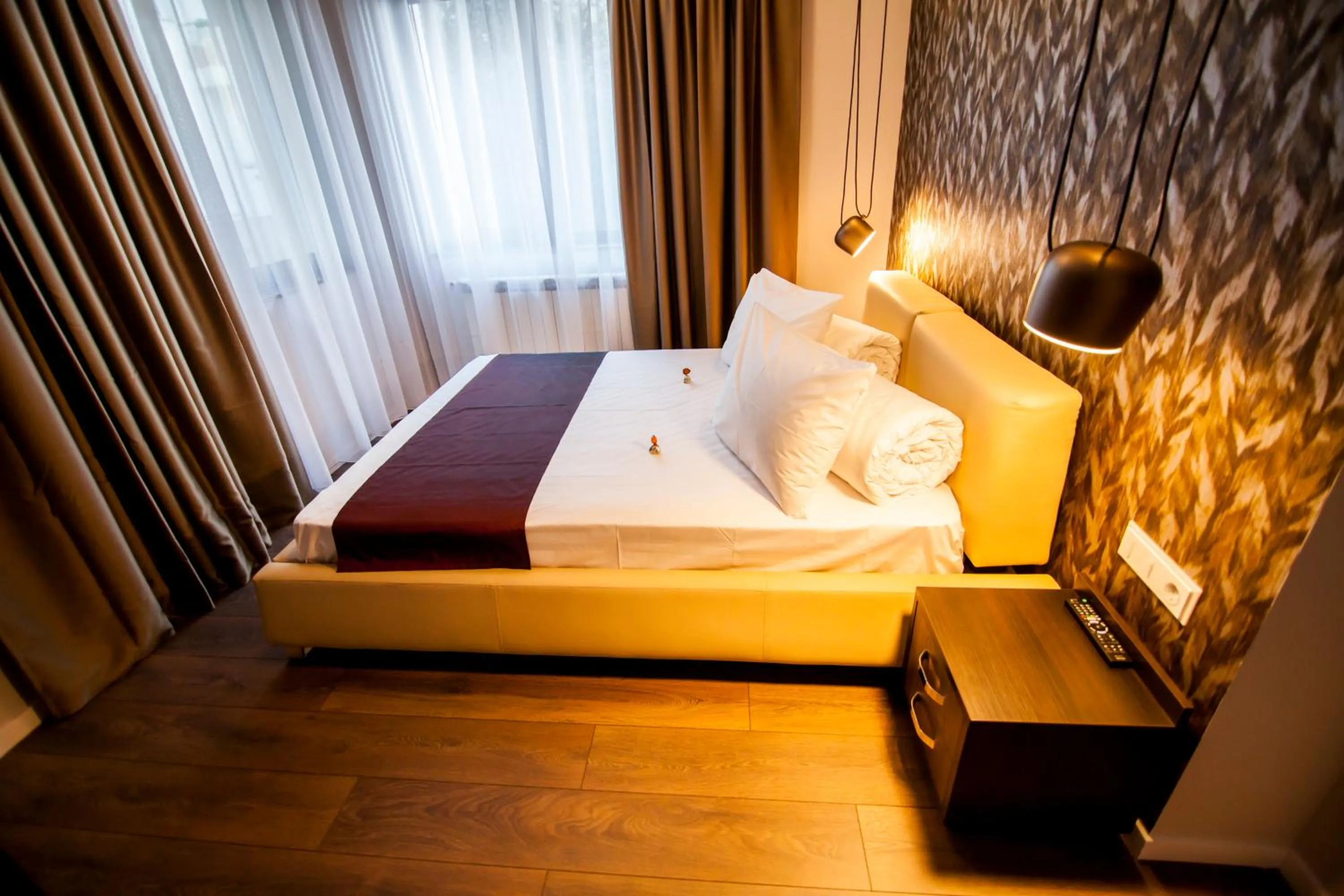 Seating area, Bed in Cluj Business Class