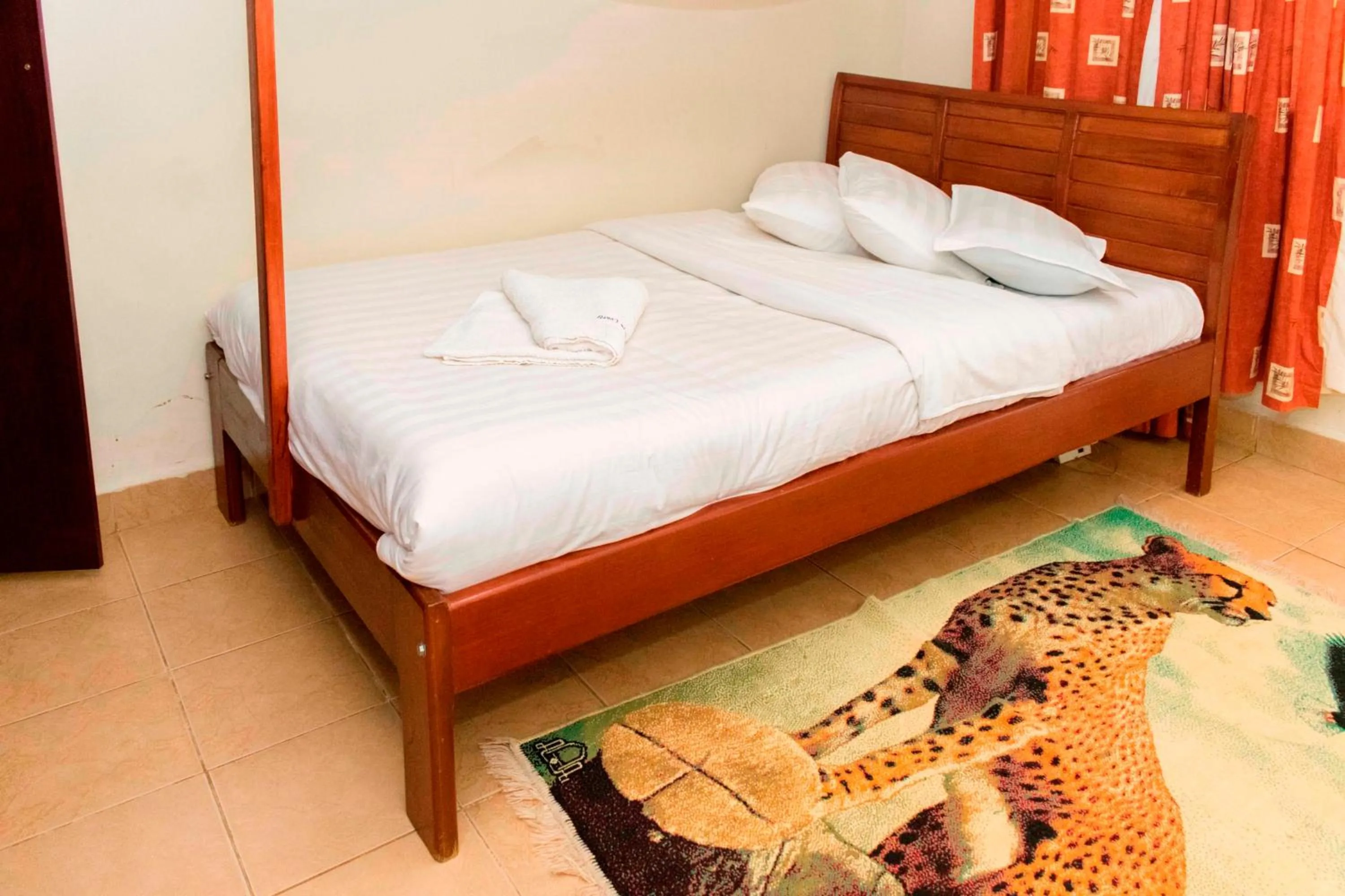 Bed in Kalya Courts Hotel Fort Portal