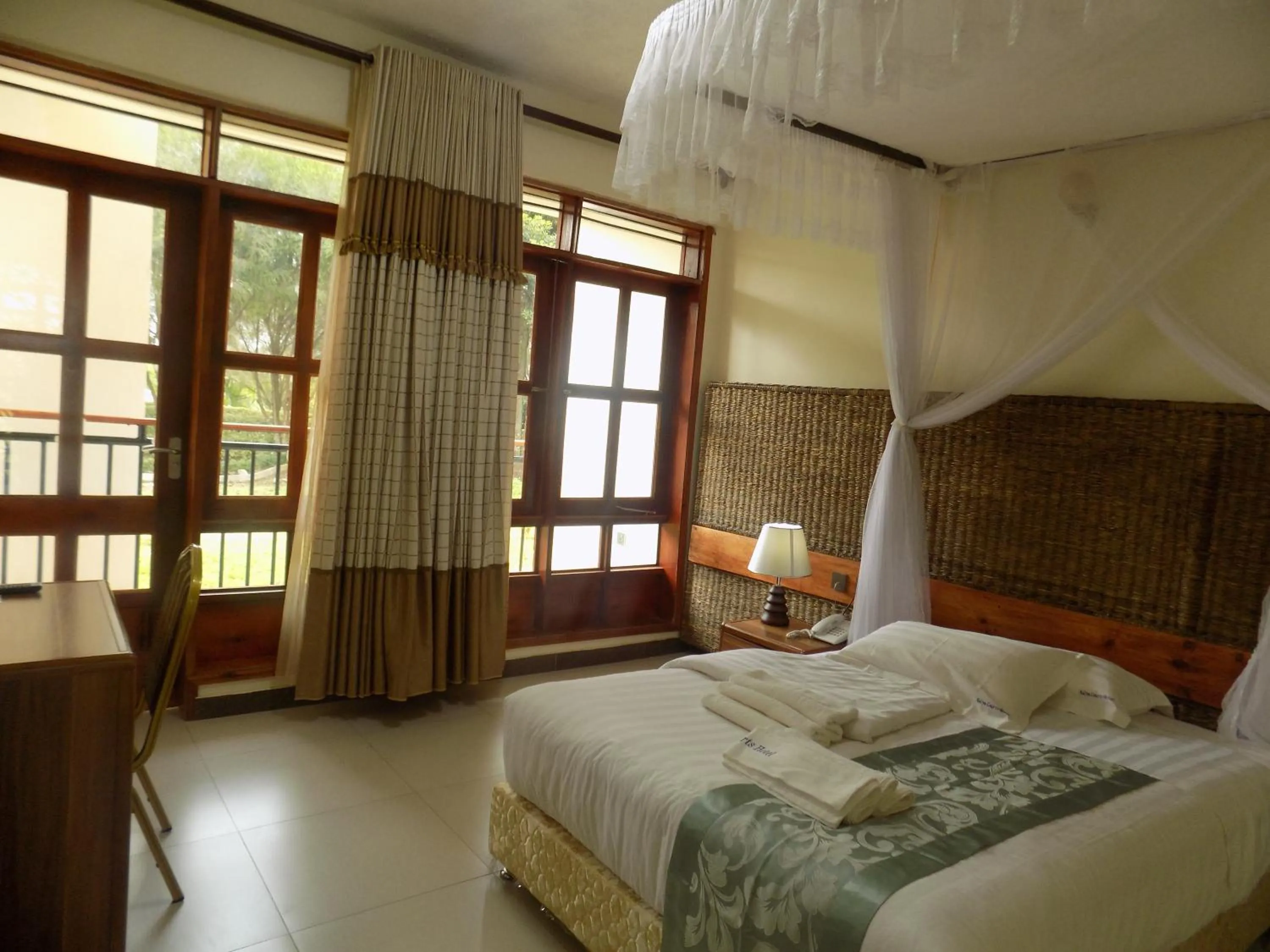 Bed in Kalya Courts Hotel Fort Portal