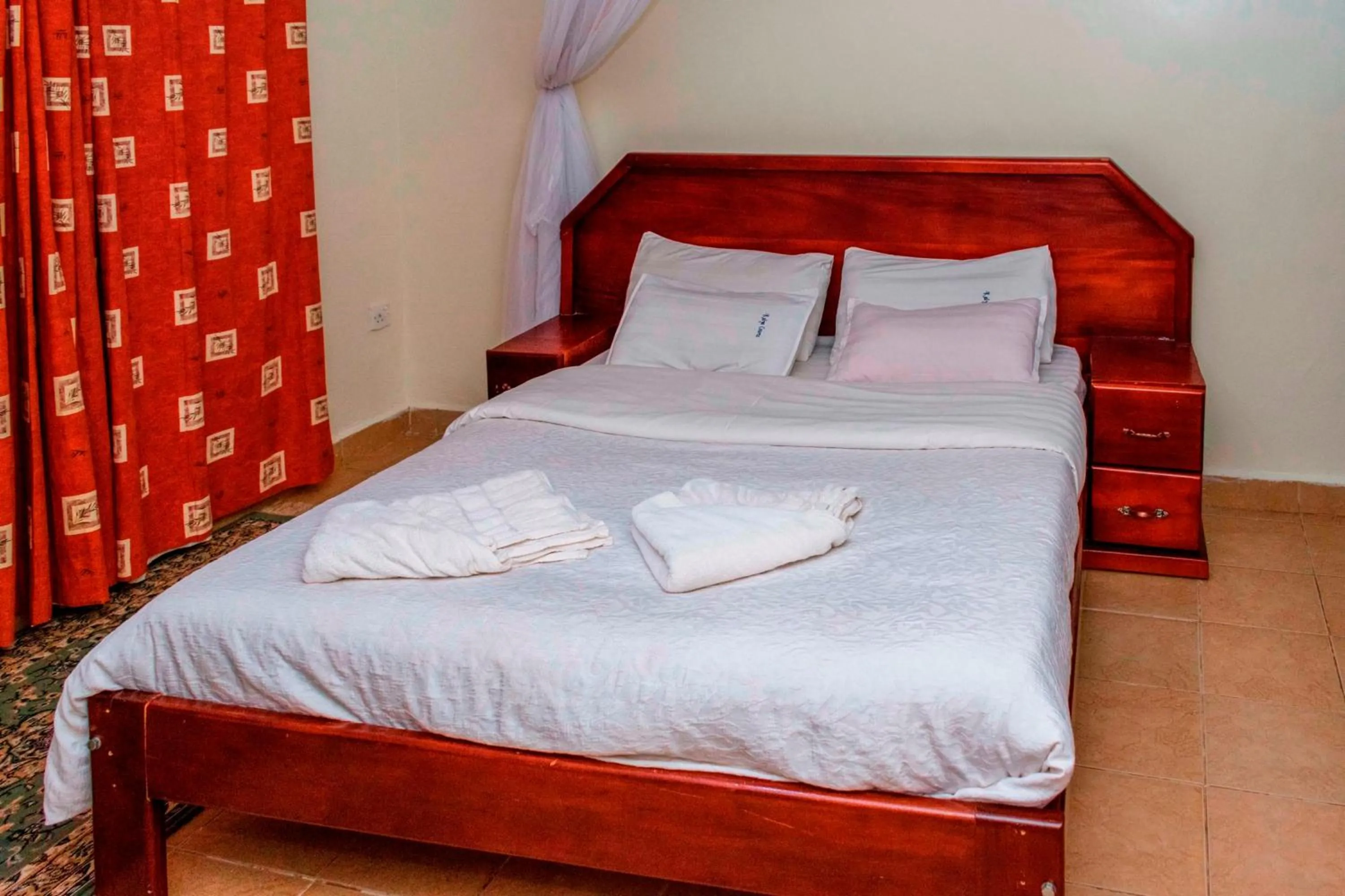 Bed in Kalya Courts Hotel Fort Portal