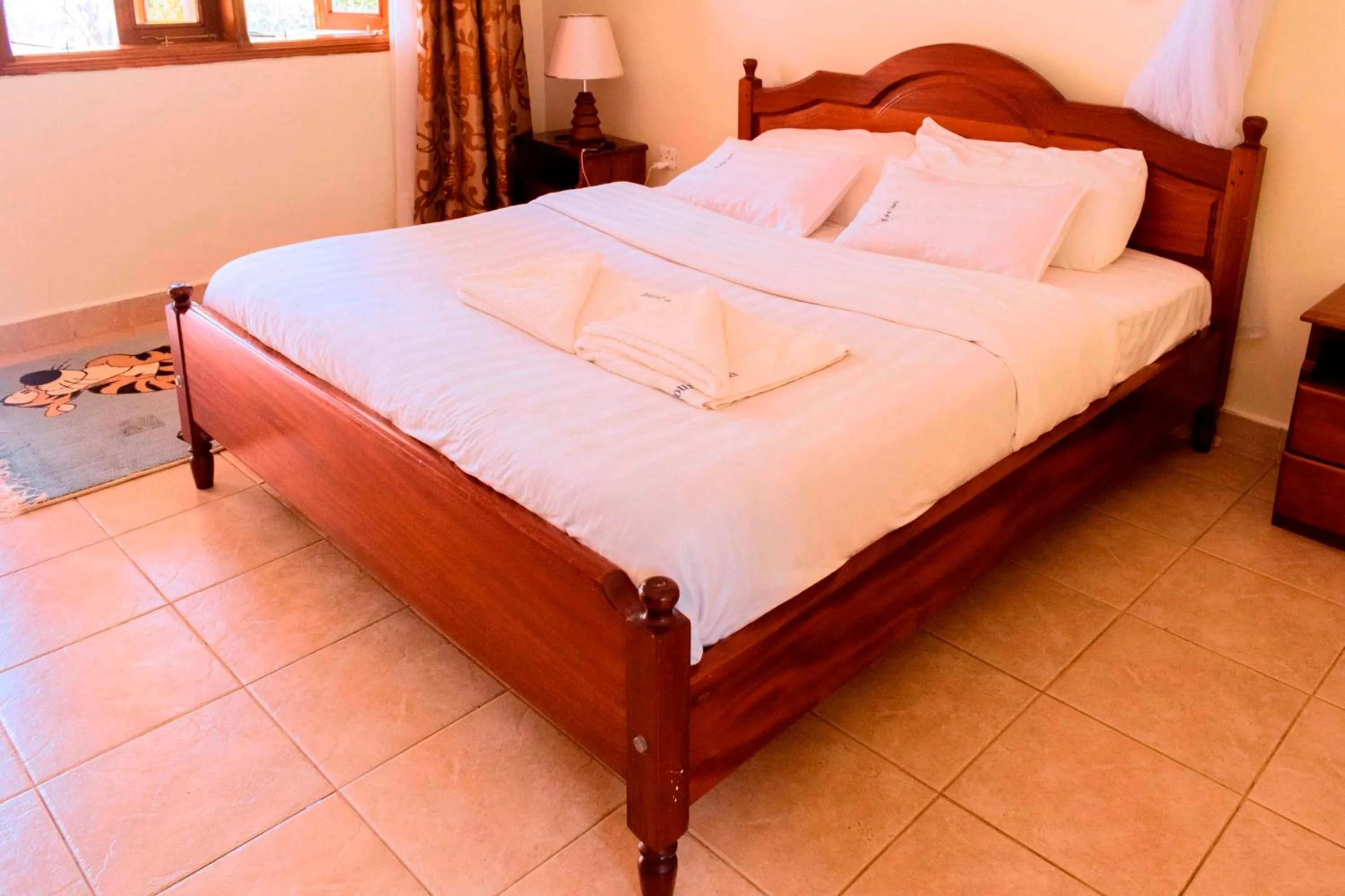 Bed in Kalya Courts Hotel Fort Portal