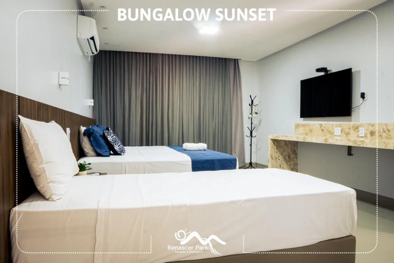 Bed in Pousada Renascer Park