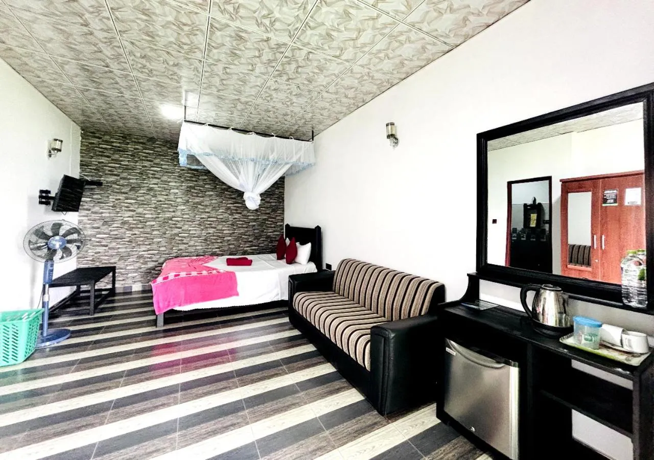 Bed in Paraiso Guest House