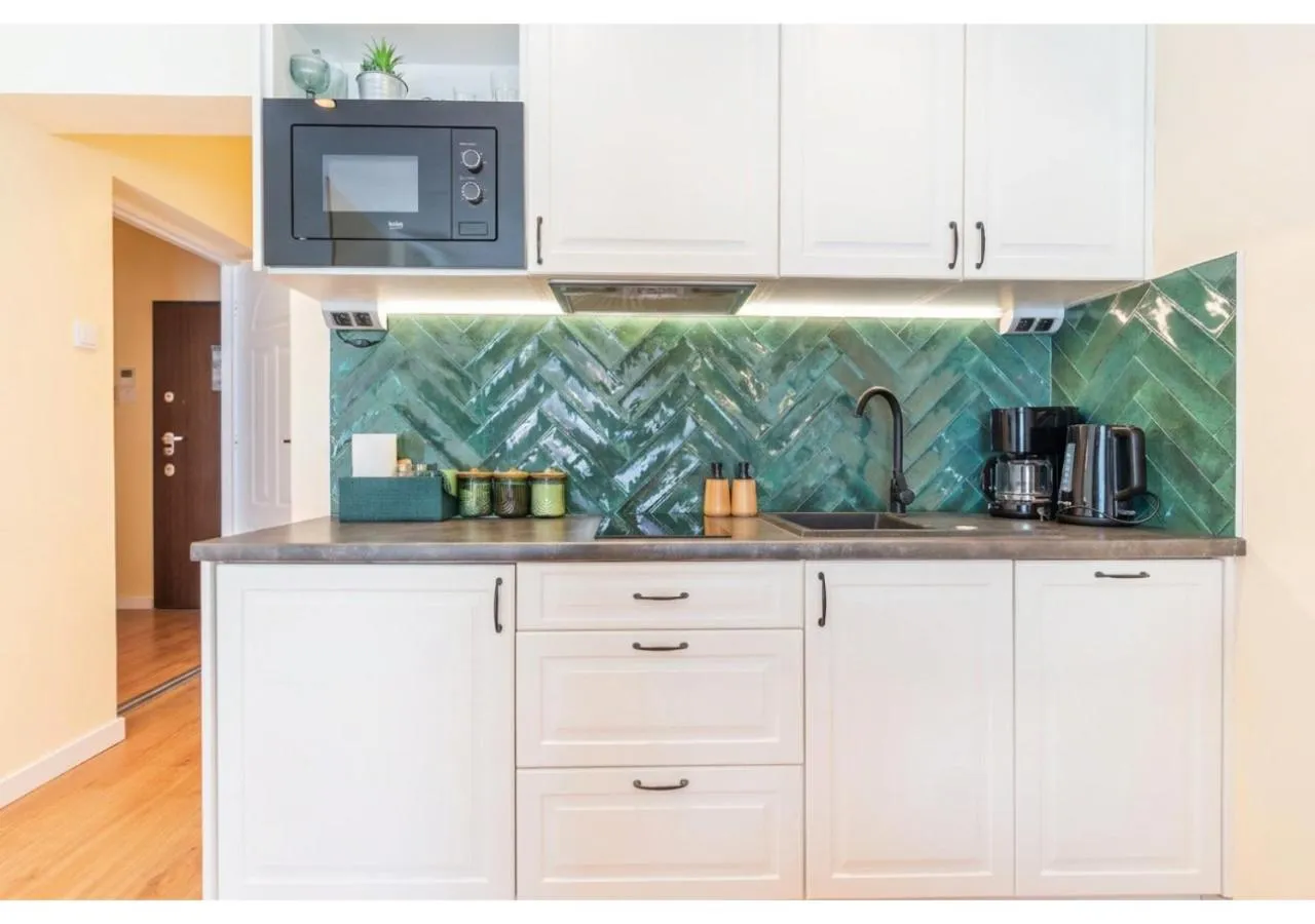 Kitchen or kitchenette in City Lights Apartments