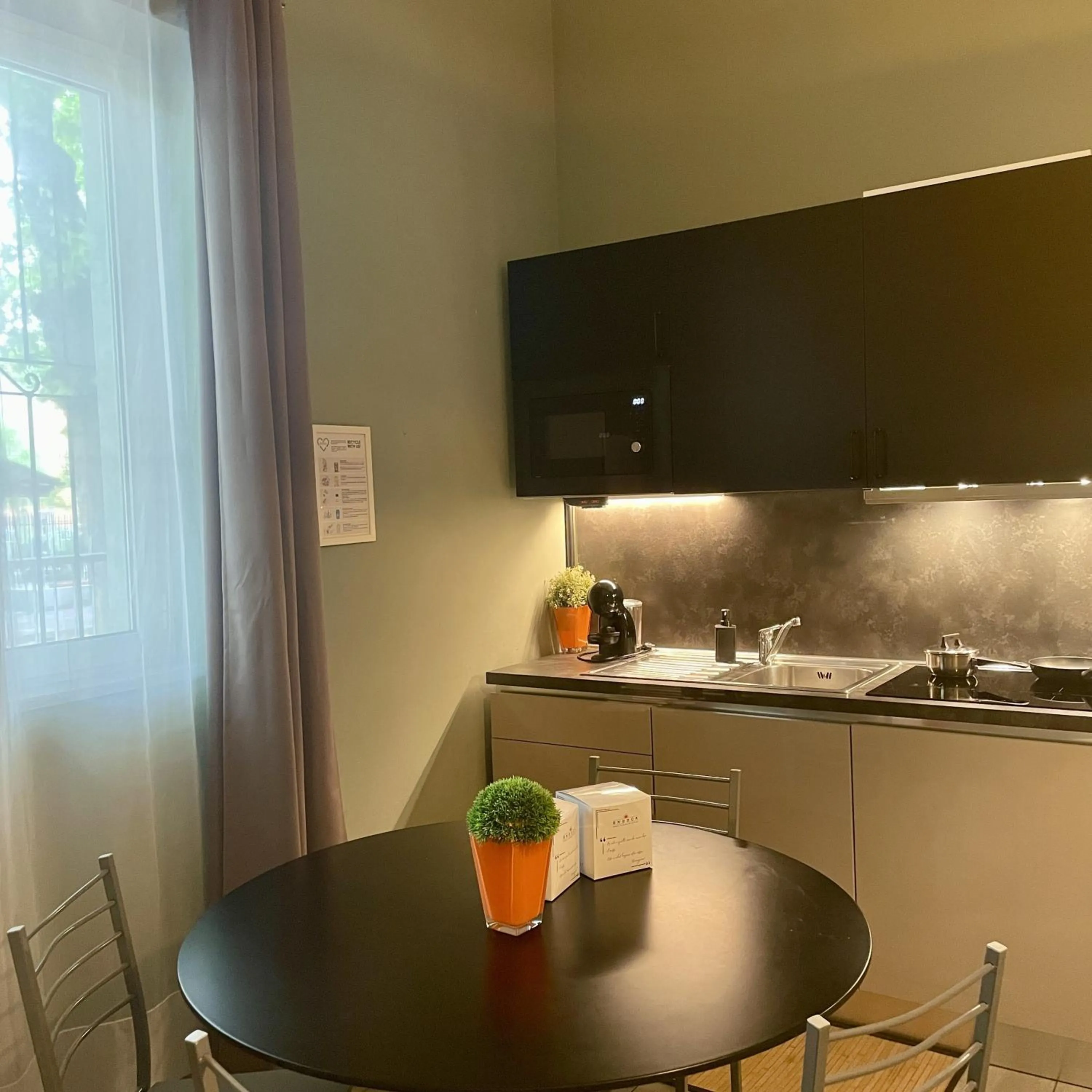 Kitchen or kitchenette in Bnbook Residence La Red