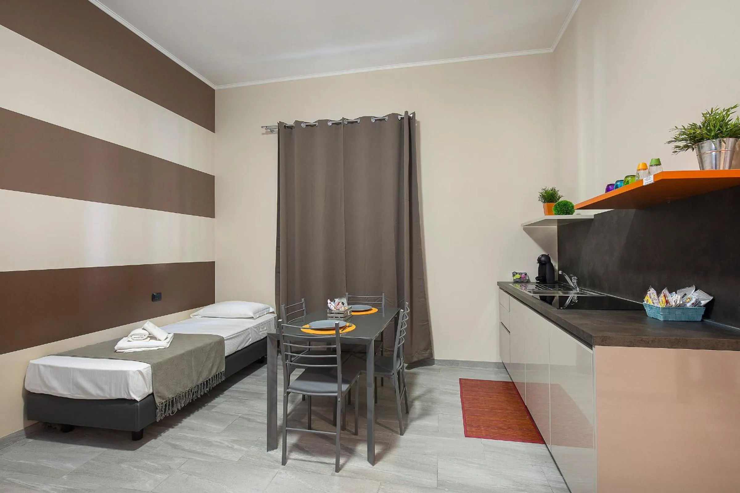 Kitchen or kitchenette, Bed in Bnbook Residence La Red