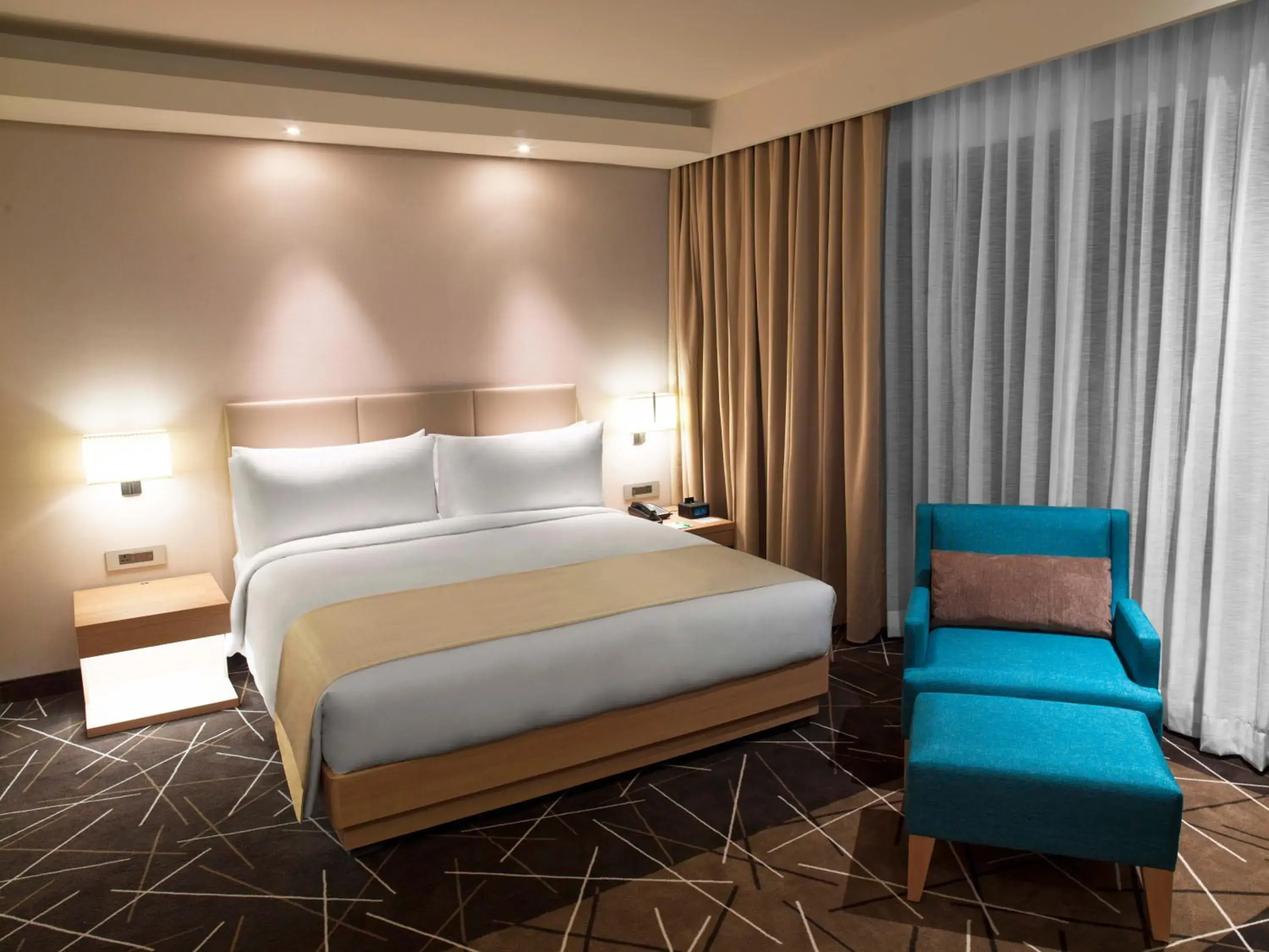 Bedroom, Bed in Holiday Inn Chennai OMR IT Expressway by IHG Bedroom, Bed in Holiday Inn Chennai OMR IT Expressway by IHG