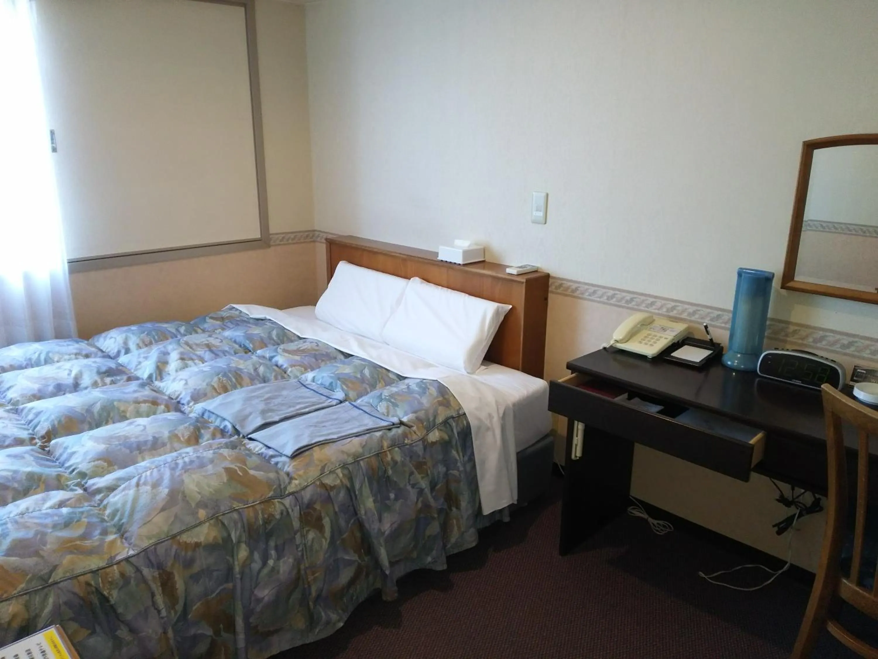 Photo of the whole room, Bed in Hotel Hyper Hills Hirosaki