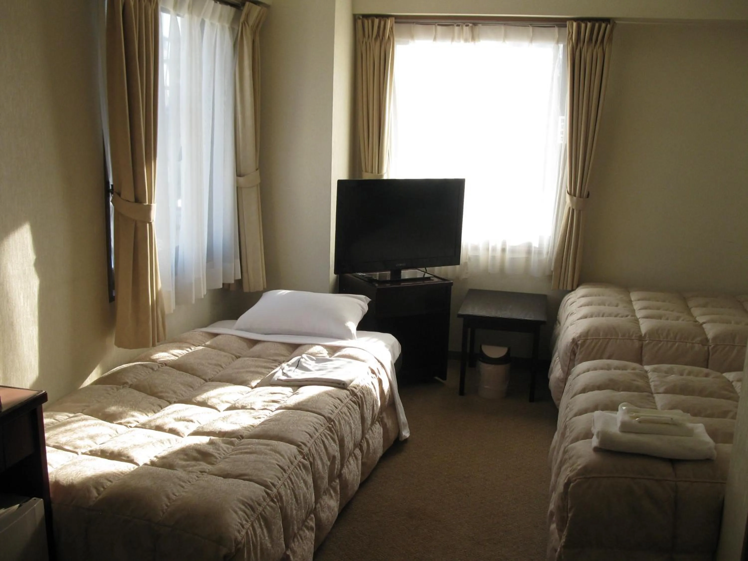 Photo of the whole room, Bed in Mito Riverside Hotel
