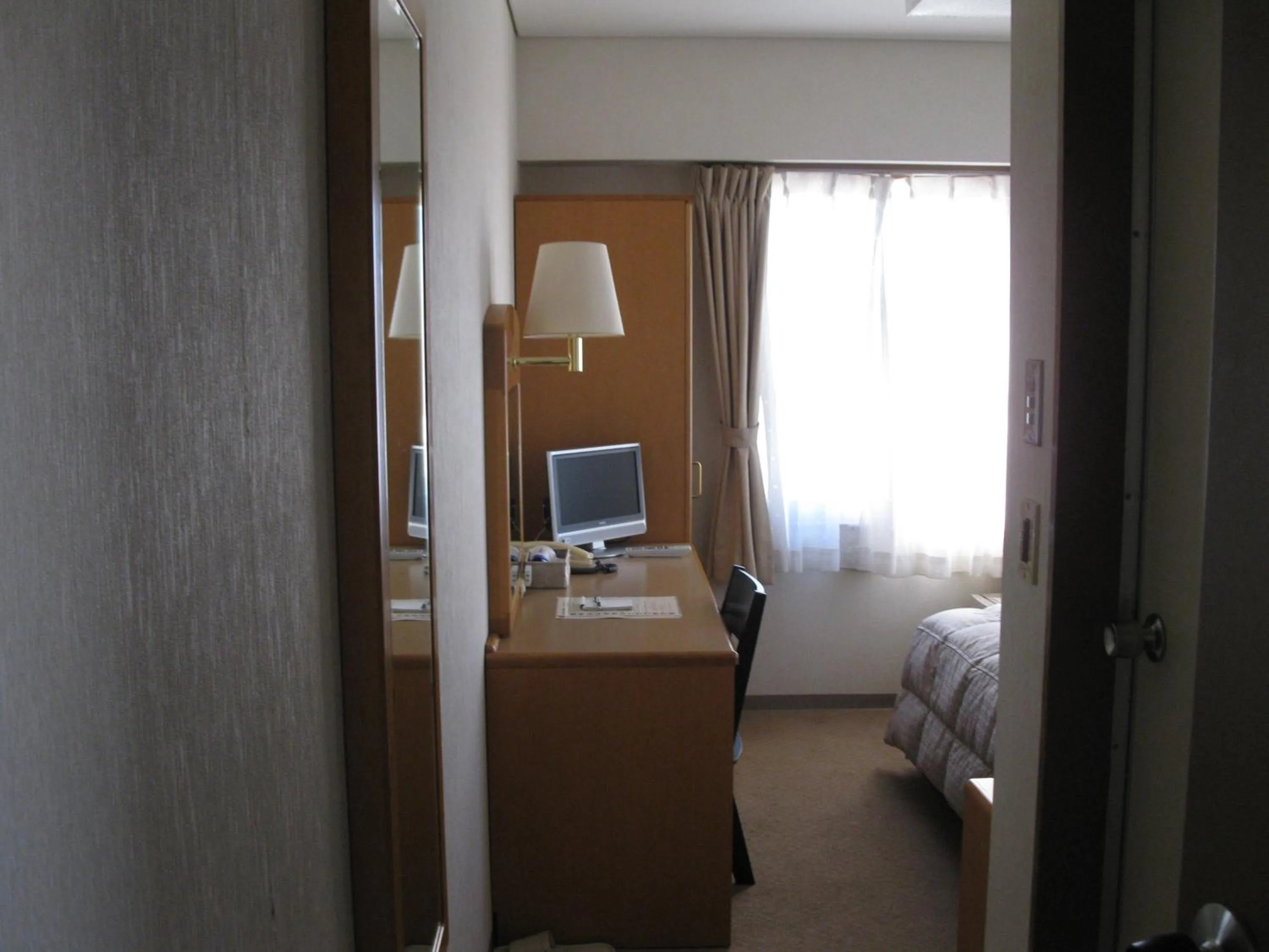 Photo of the whole room, Bed in Mito Riverside Hotel