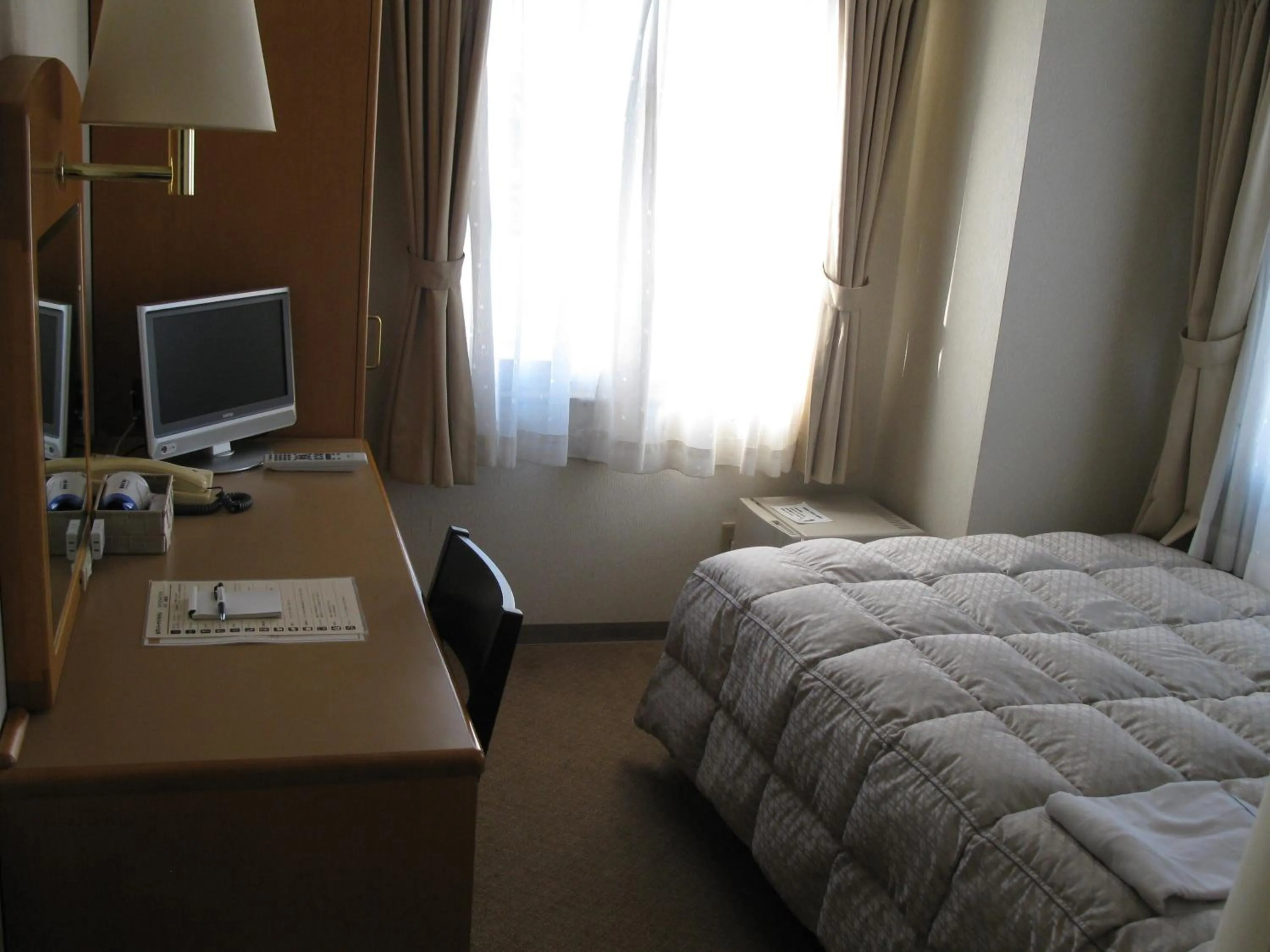 Photo of the whole room, Bed in Mito Riverside Hotel
