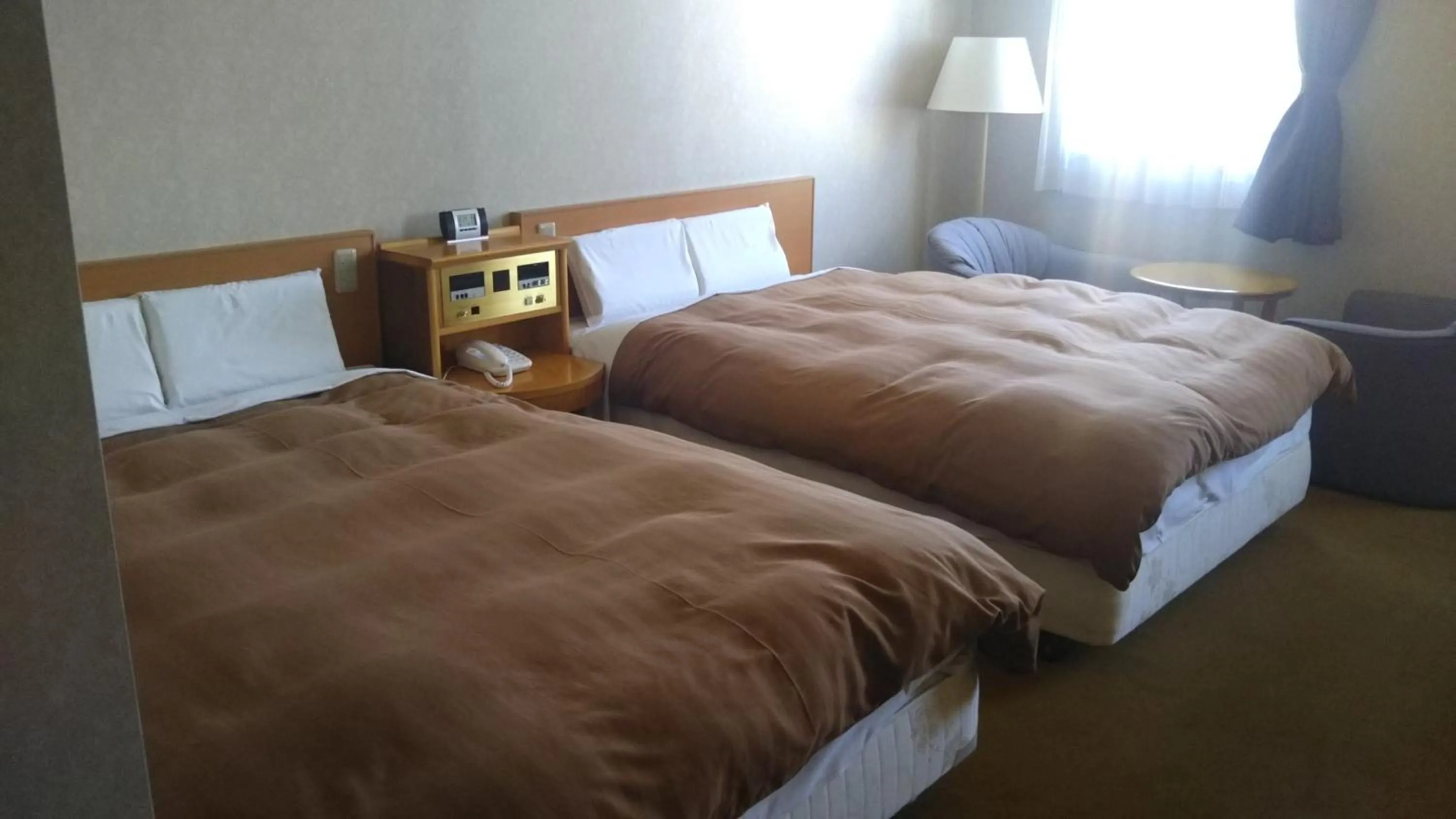 Bed in Hotel Hitachi Hills