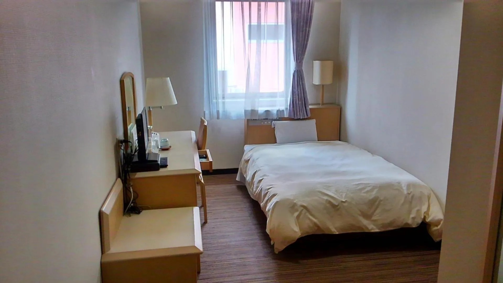 Photo of the whole room, Bed in Hotel Hitachi Hills
