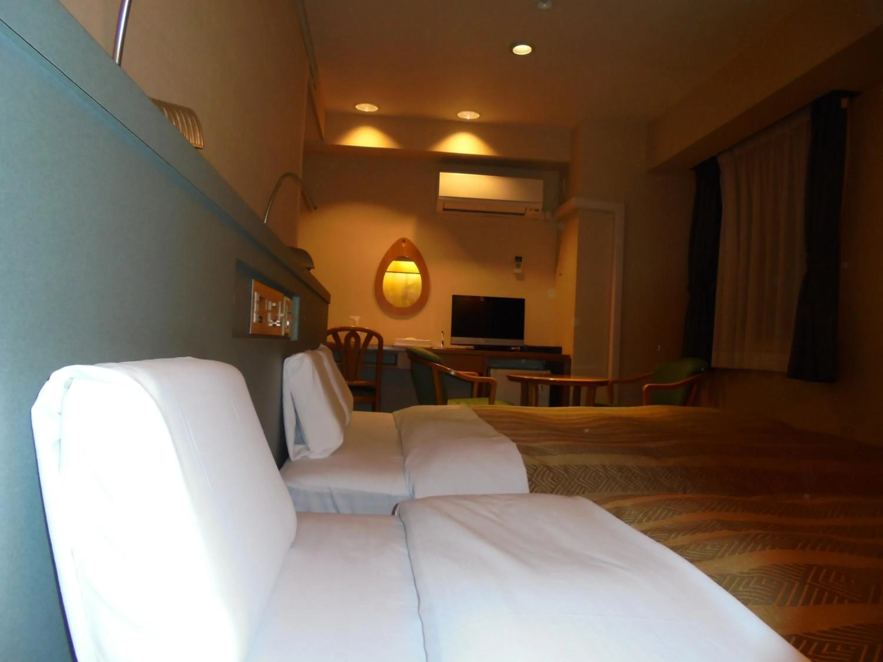 Bed in Spa & Sauna Hotel Hitachi Plaza