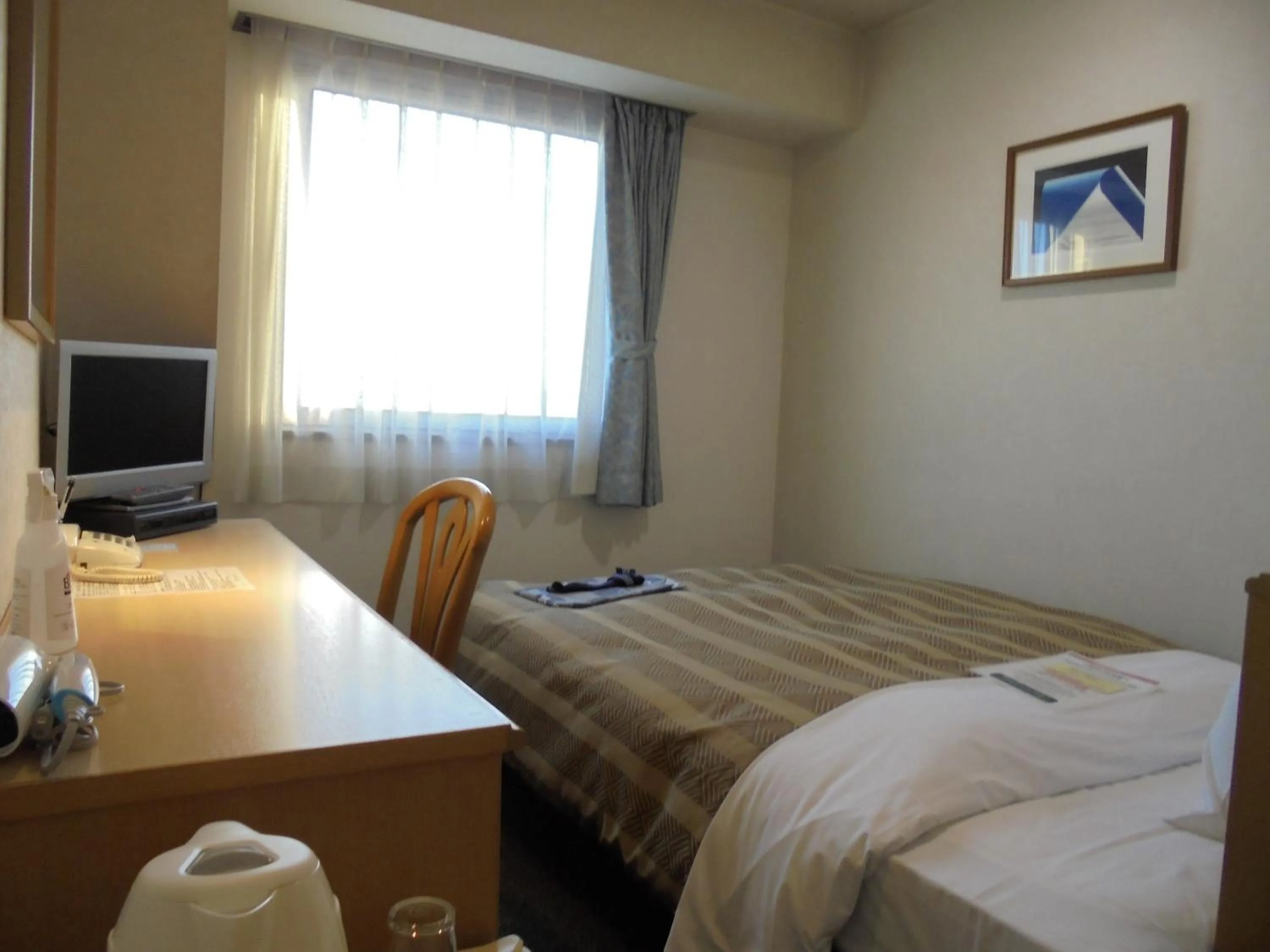 Photo of the whole room, Bed in Spa & Sauna Hotel Hitachi Plaza