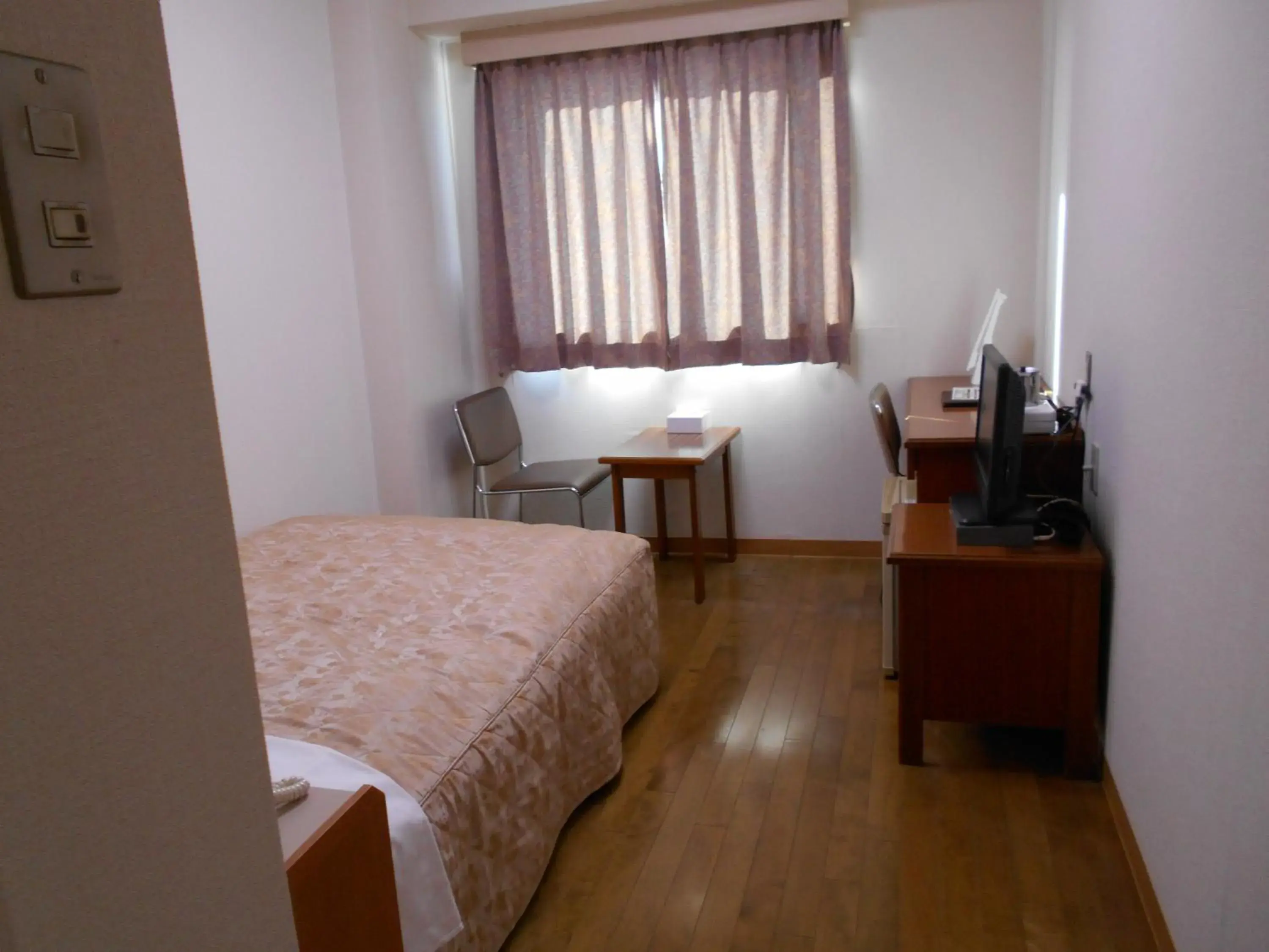 Bed in New Central Hotel Katsuta Bed in New Central Hotel Katsuta