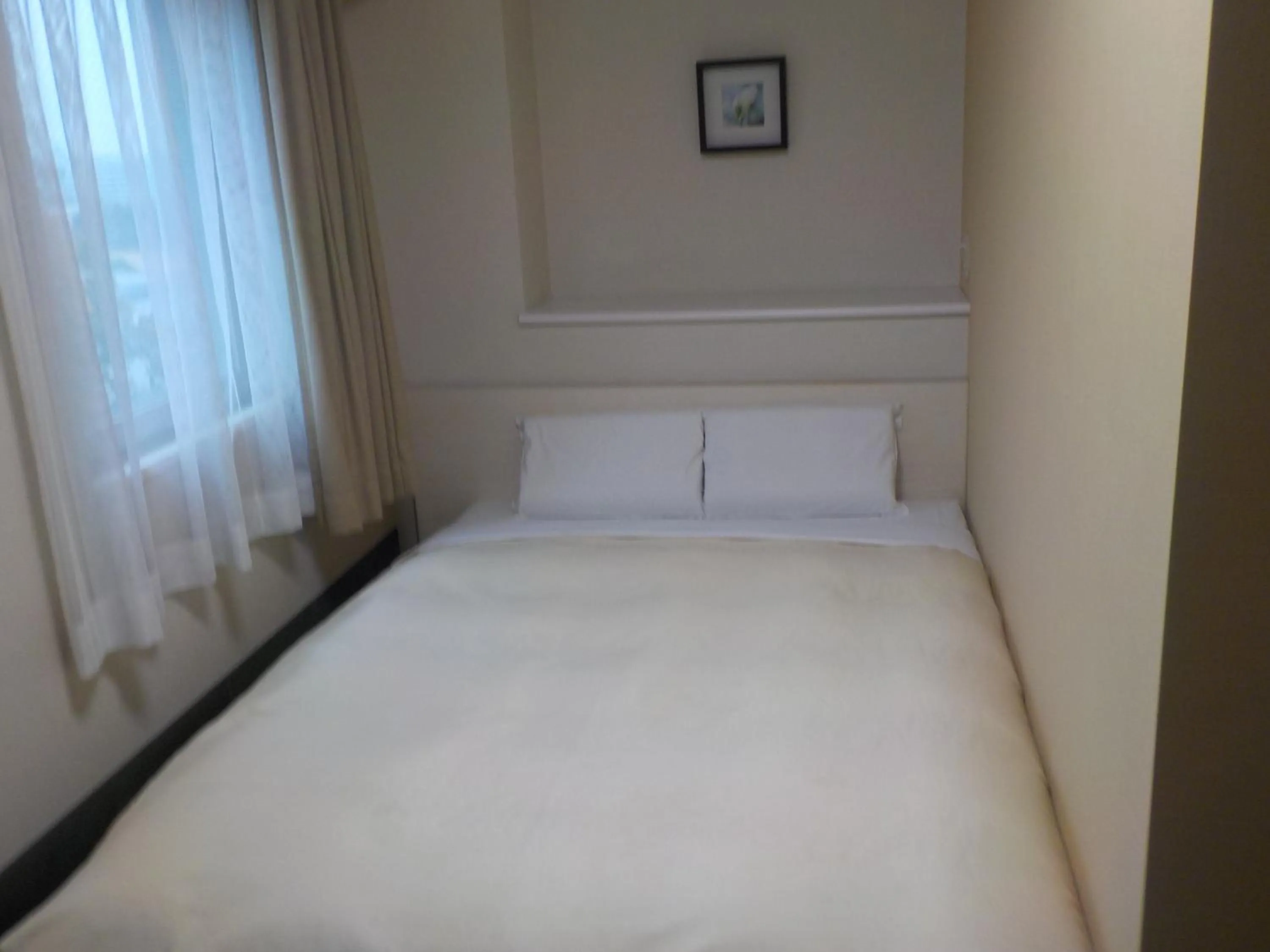 Bed in Hotel Crown Hills Katsuta Omotechoten