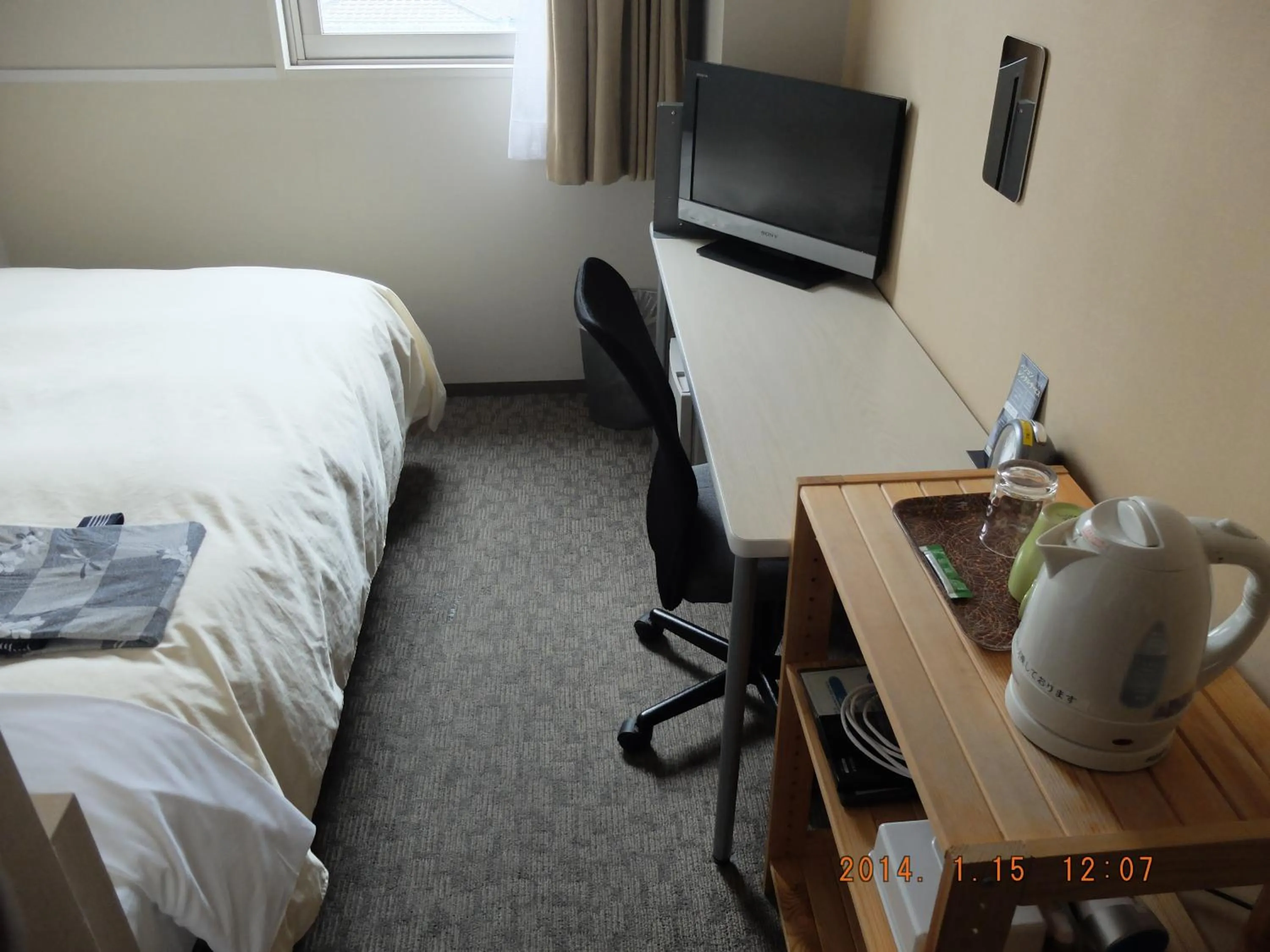 Photo of the whole room, Bed in Hotel Crown Hills Katsuta Omotechoten