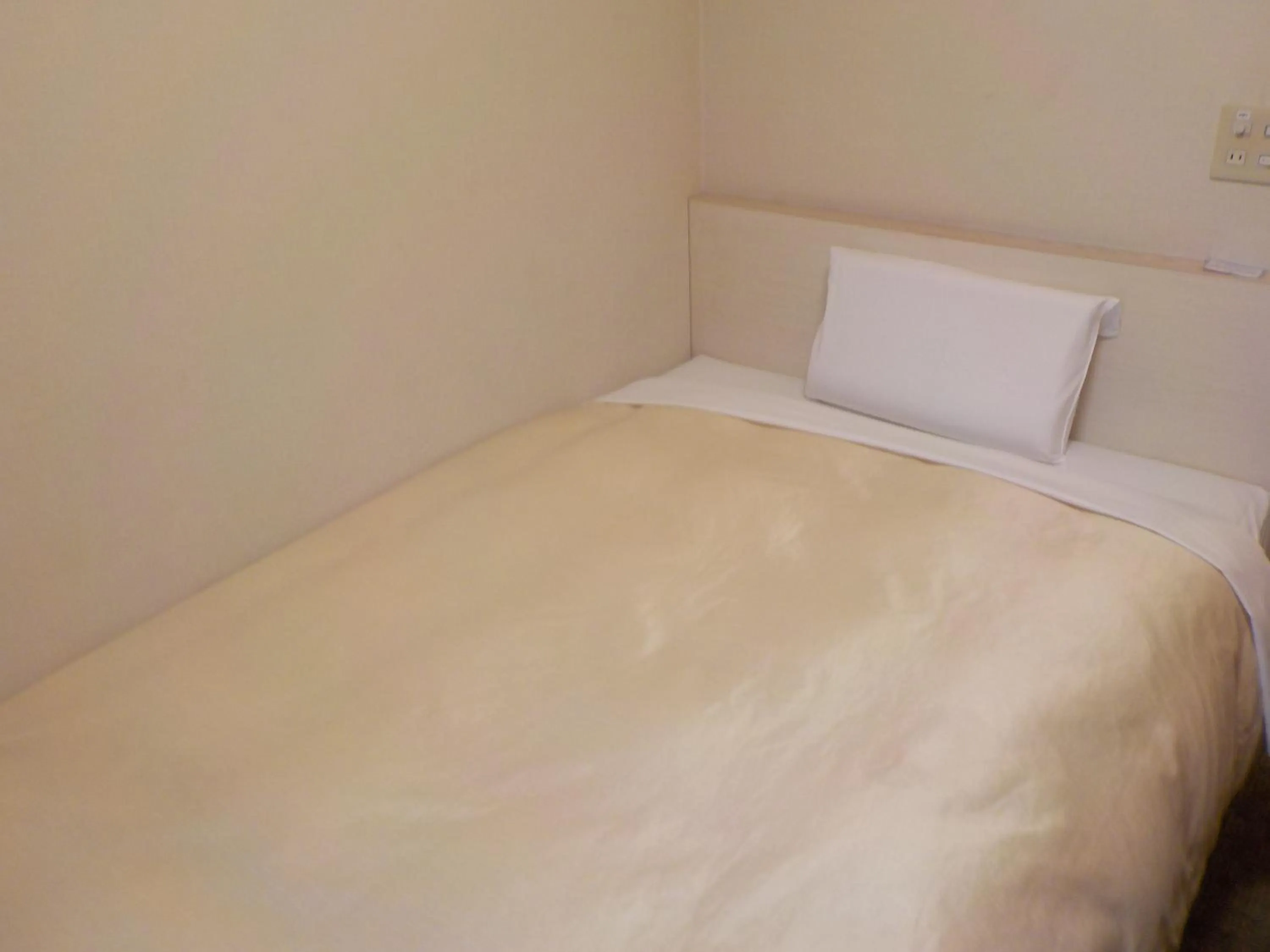 Bed in Hotel Crown Hills Katsuta Omotechoten