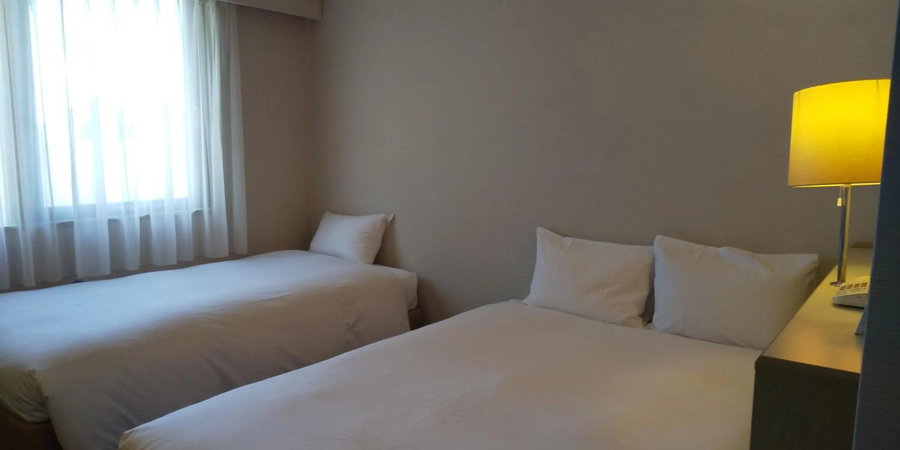 Photo of the whole room, Bed in Hotel Crown Hills Sagamihara