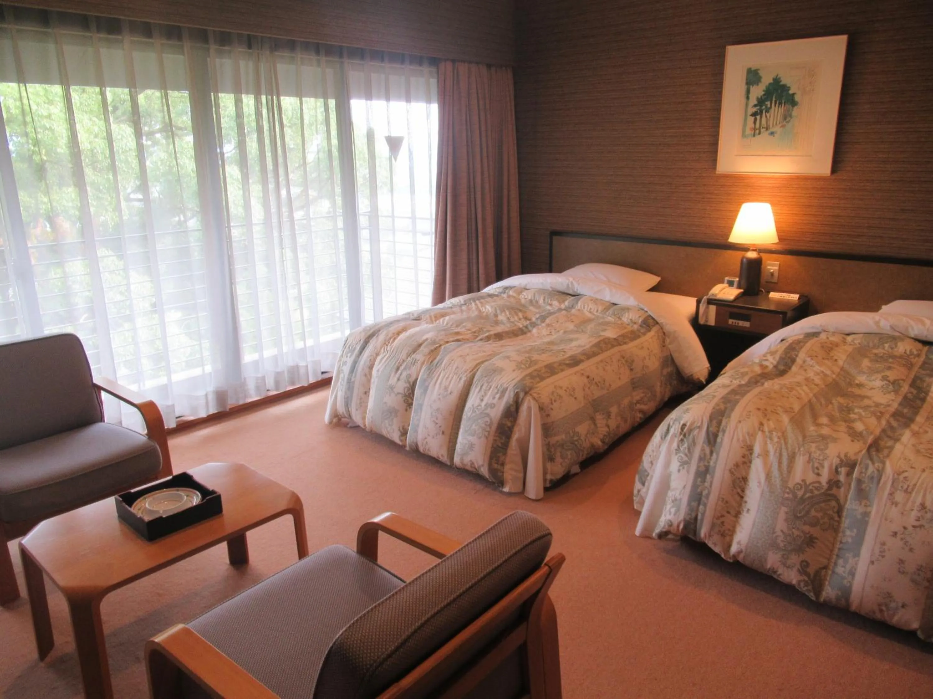 Photo of the whole room, Bed in Kikuchi Kanko Hotel