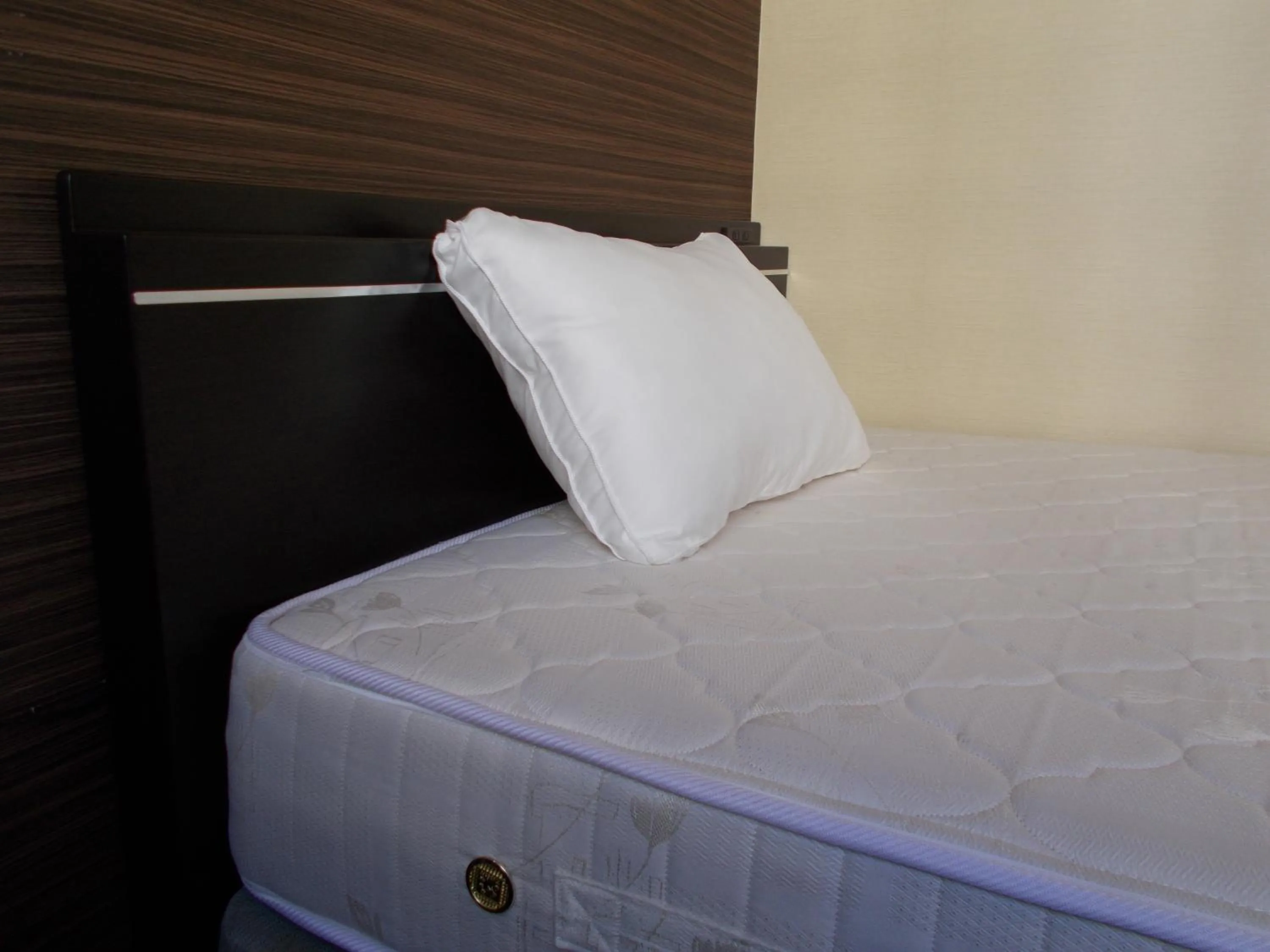 Bed in Hotel Matsuyama Hills