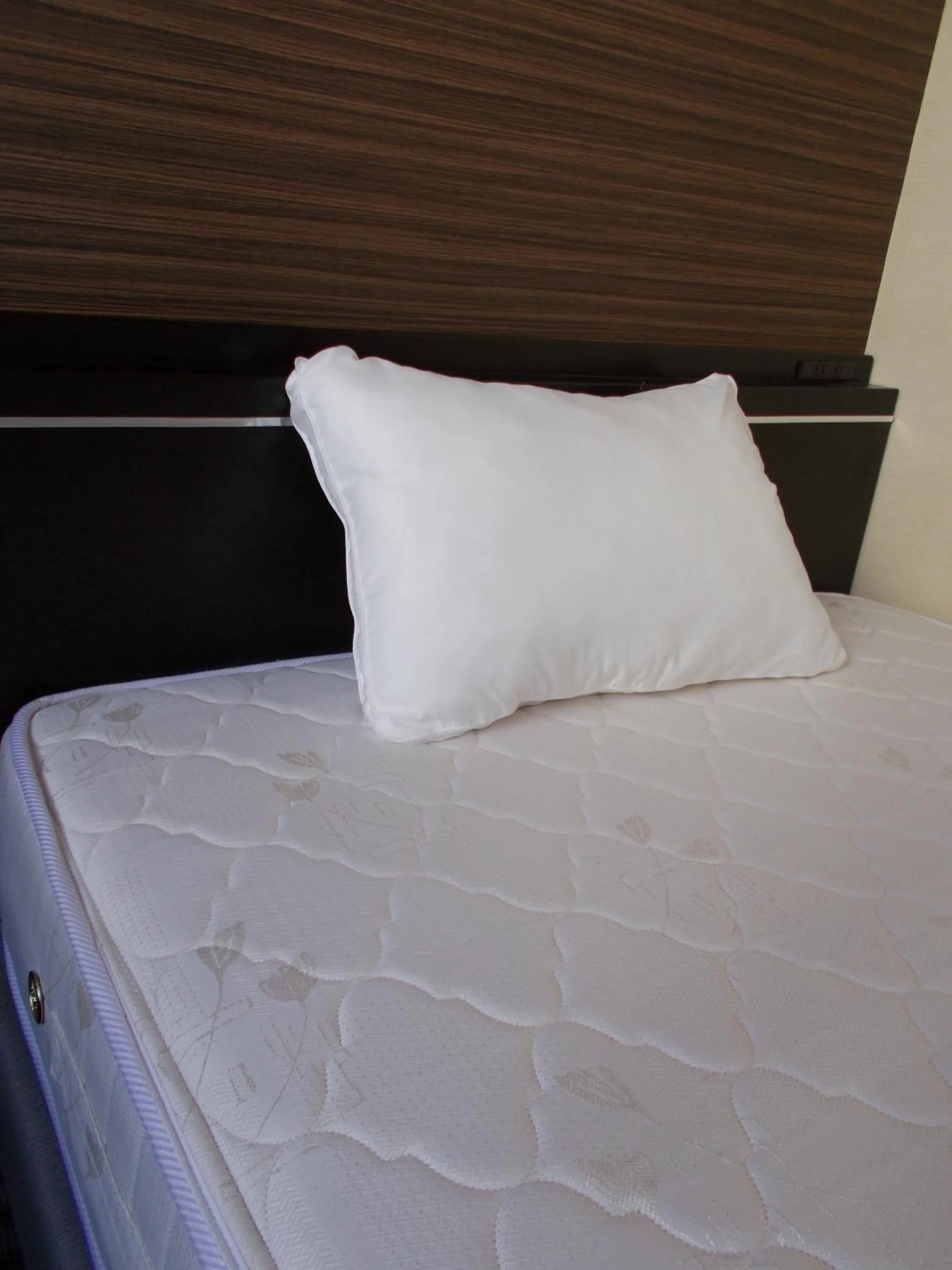 Bed in Hotel Matsuyama Hills