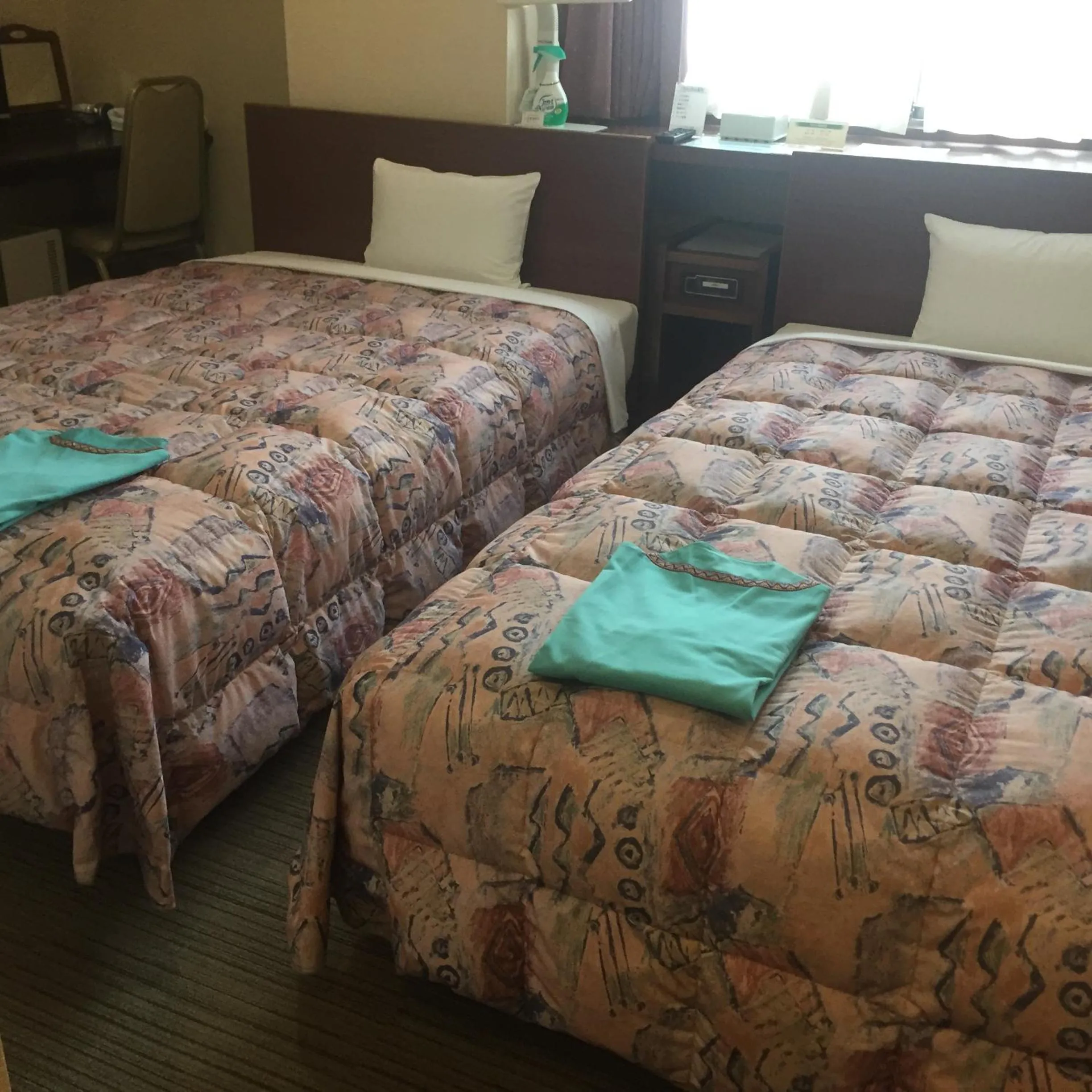 Bed in Hotel Niihama Hills