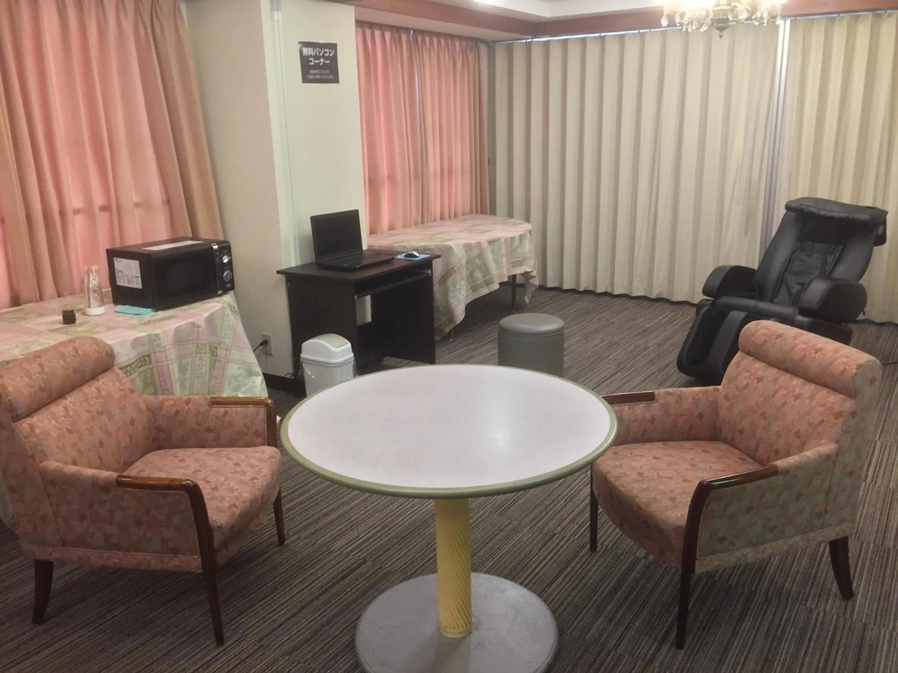 Communal lounge/ TV room in Hotel Niihama Hills Prince House