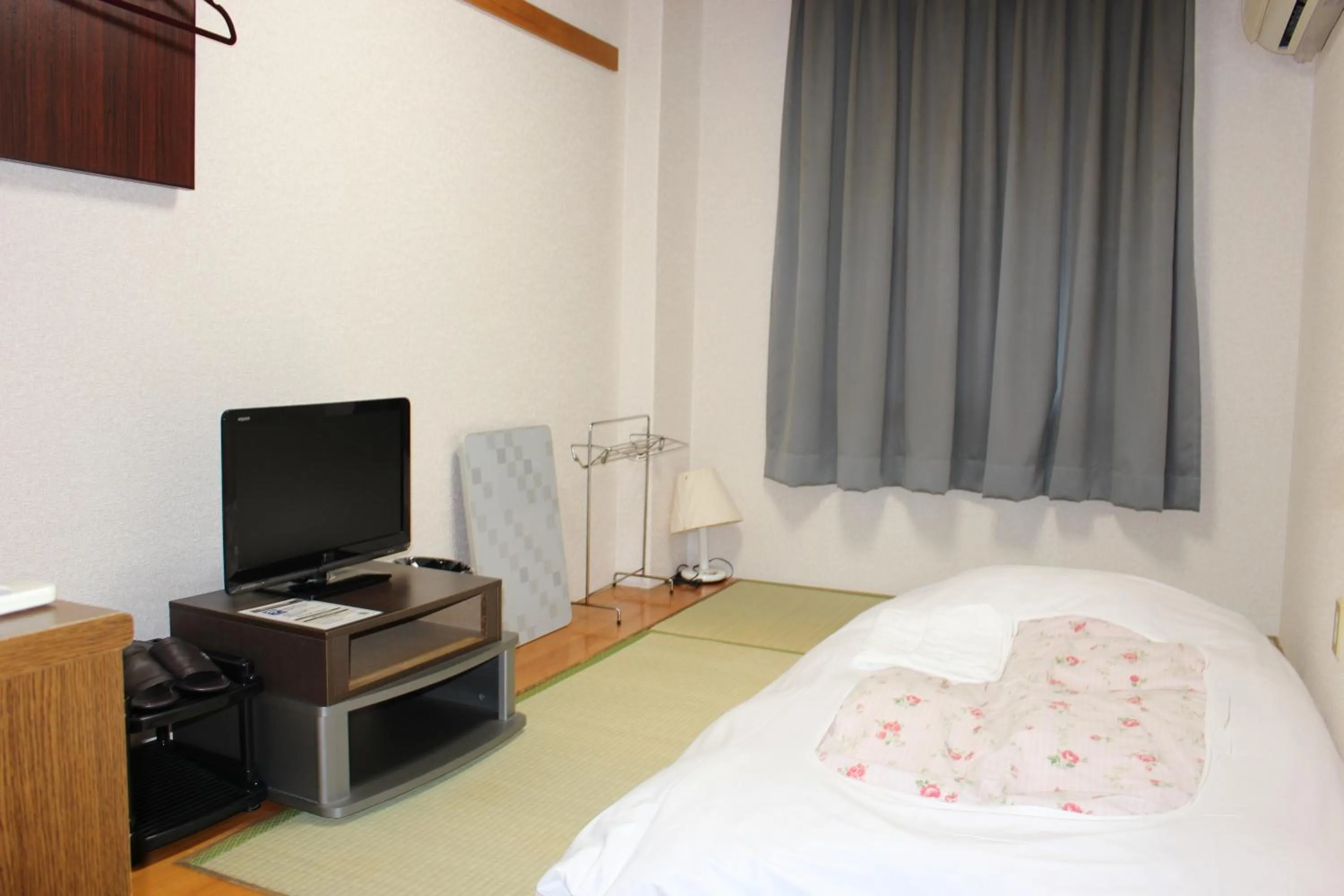 Bed in Hotel Higashihiroshima Hills Saijo