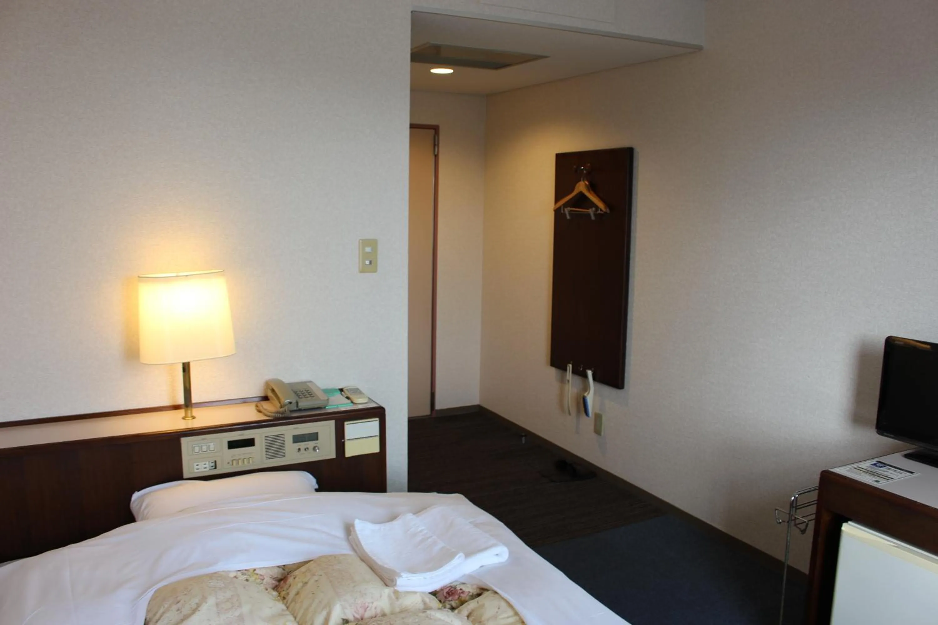 Bed in Hotel Higashihiroshima Hills Saijo