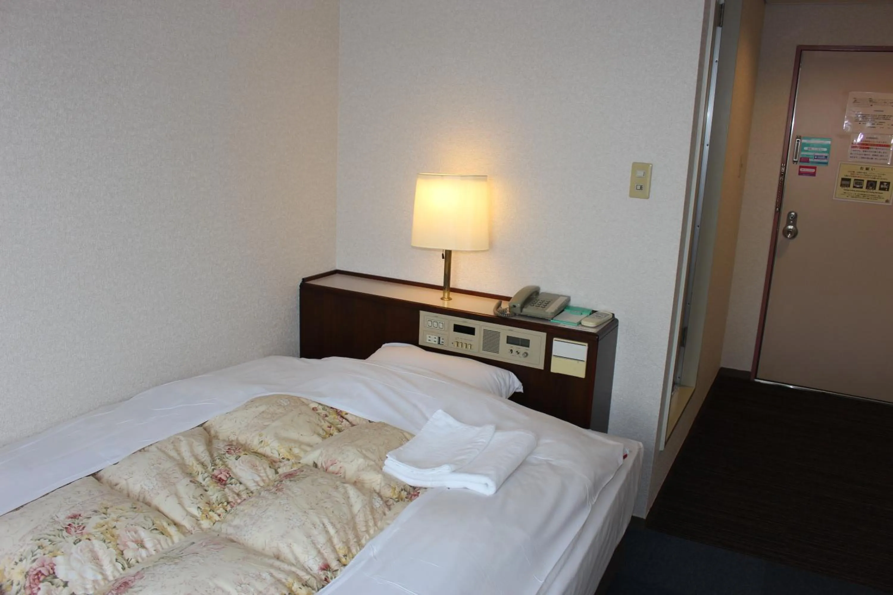 Bed in Hotel Higashihiroshima Hills Saijo