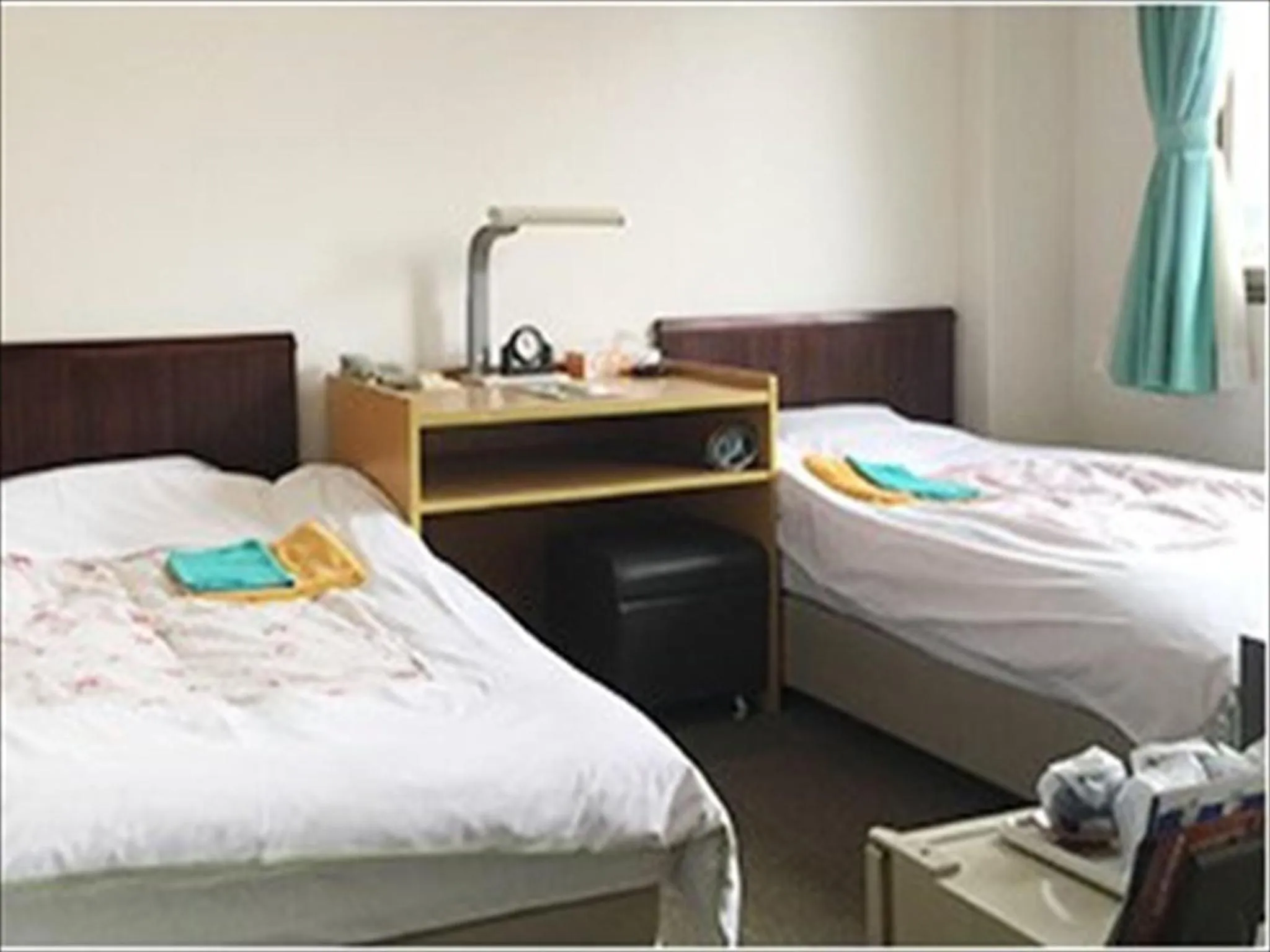 Bed in Hotel Higashihiroshima Hills Saijo