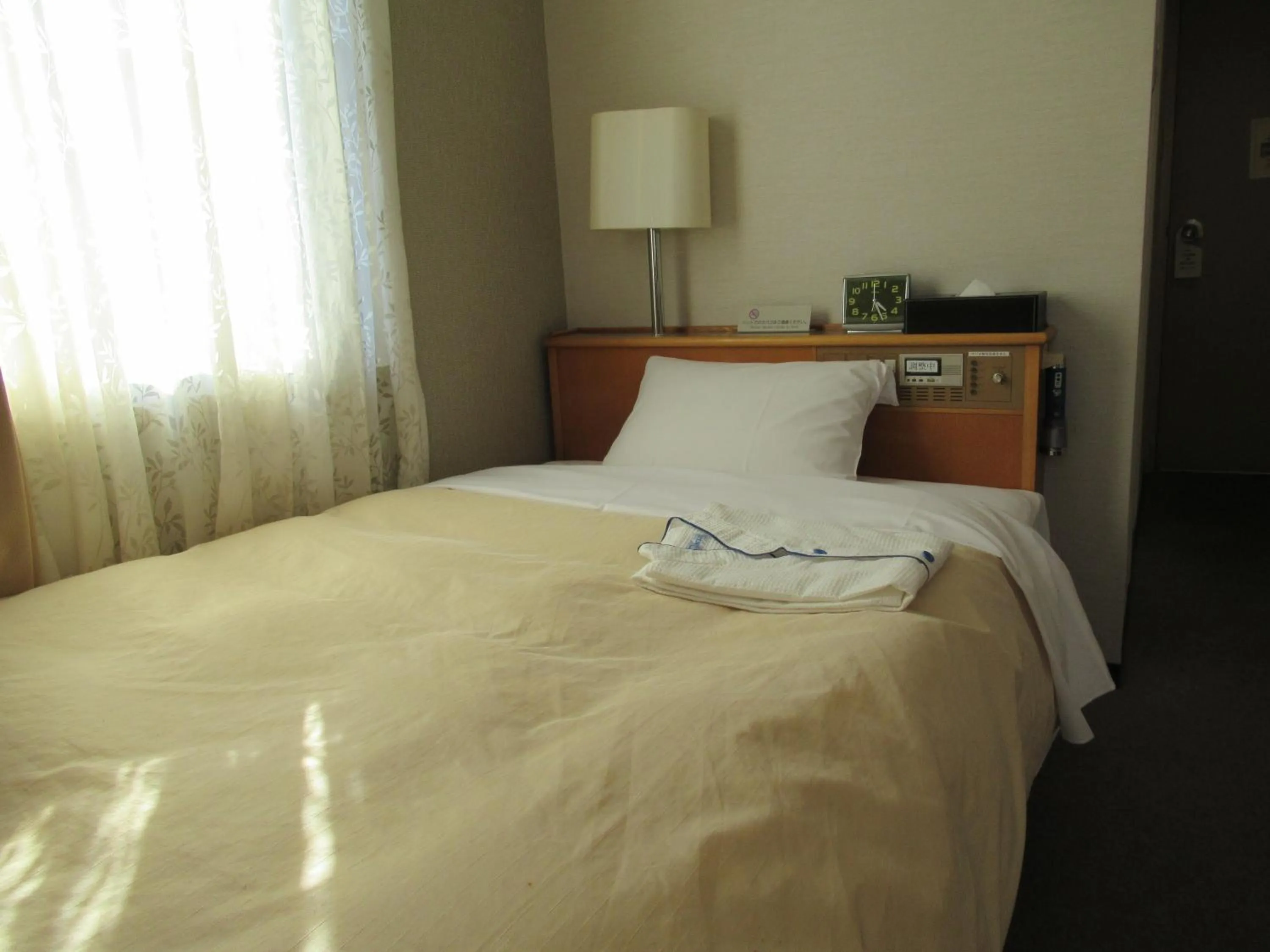 Photo of the whole room, Bed in Center Hotel Mihara