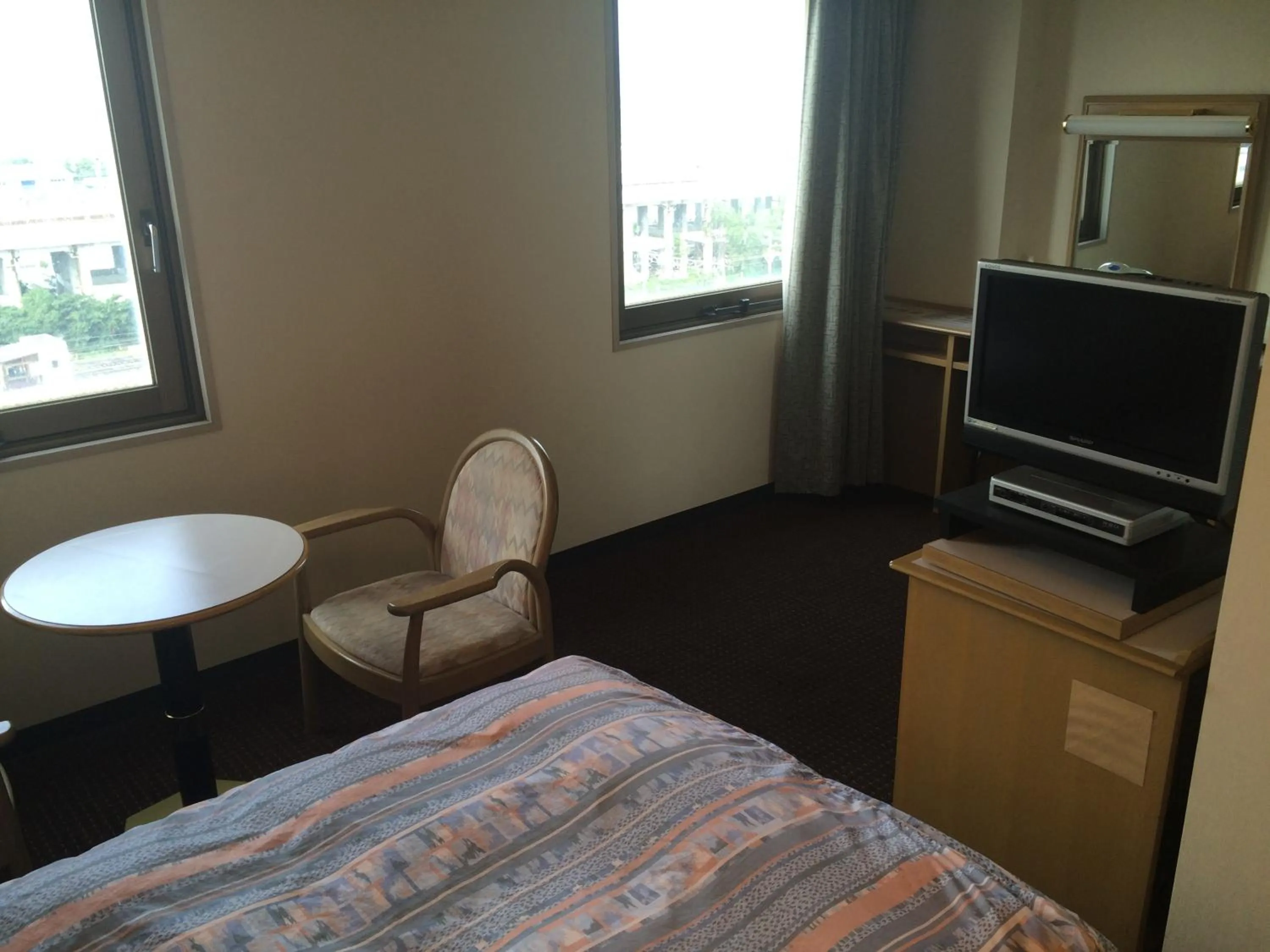 Photo of the whole room, Bed in Hotel Crown Hills Tokuyama