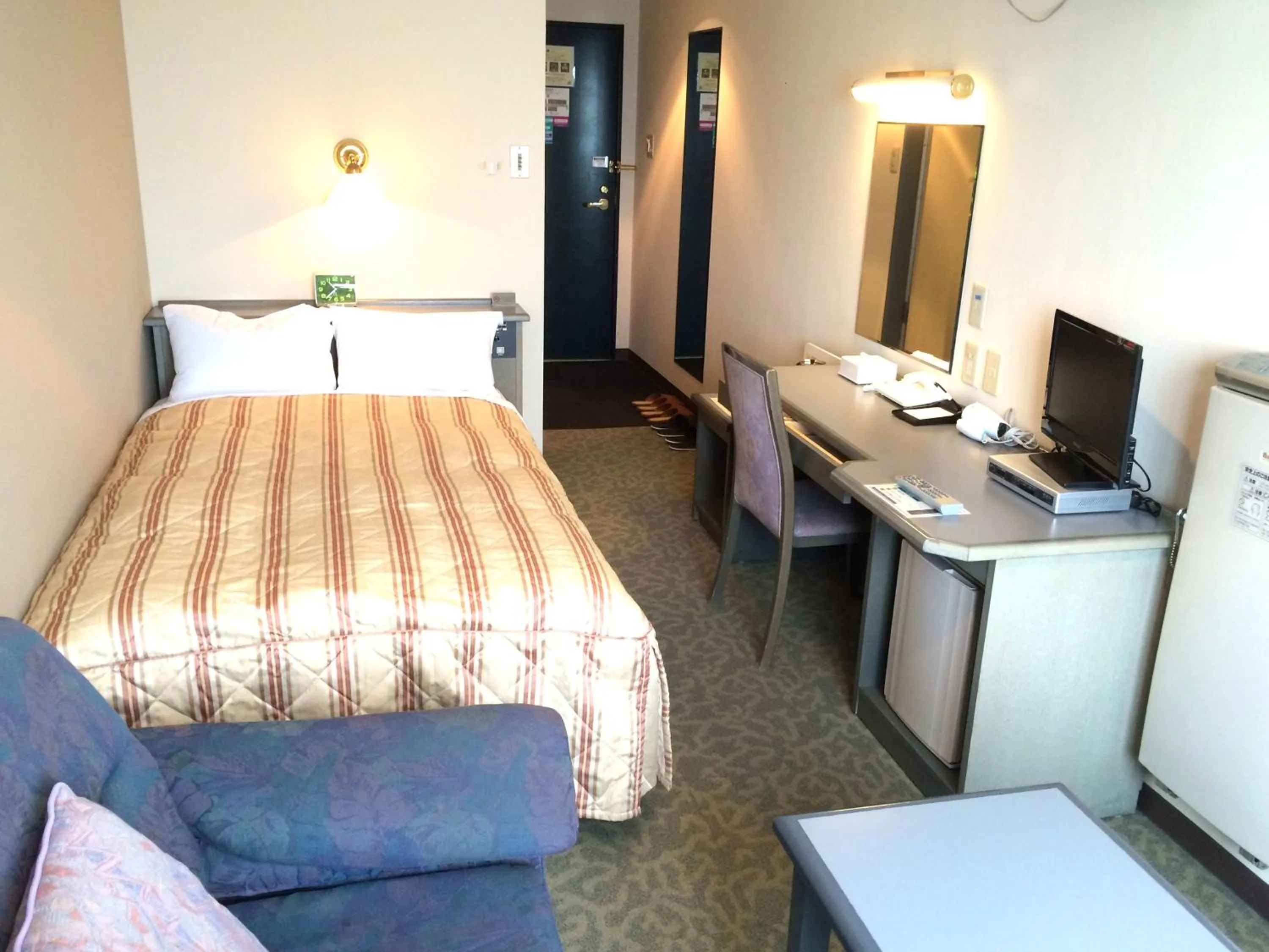 Photo of the whole room, Bed in Hotel Crown Hills Takaoka